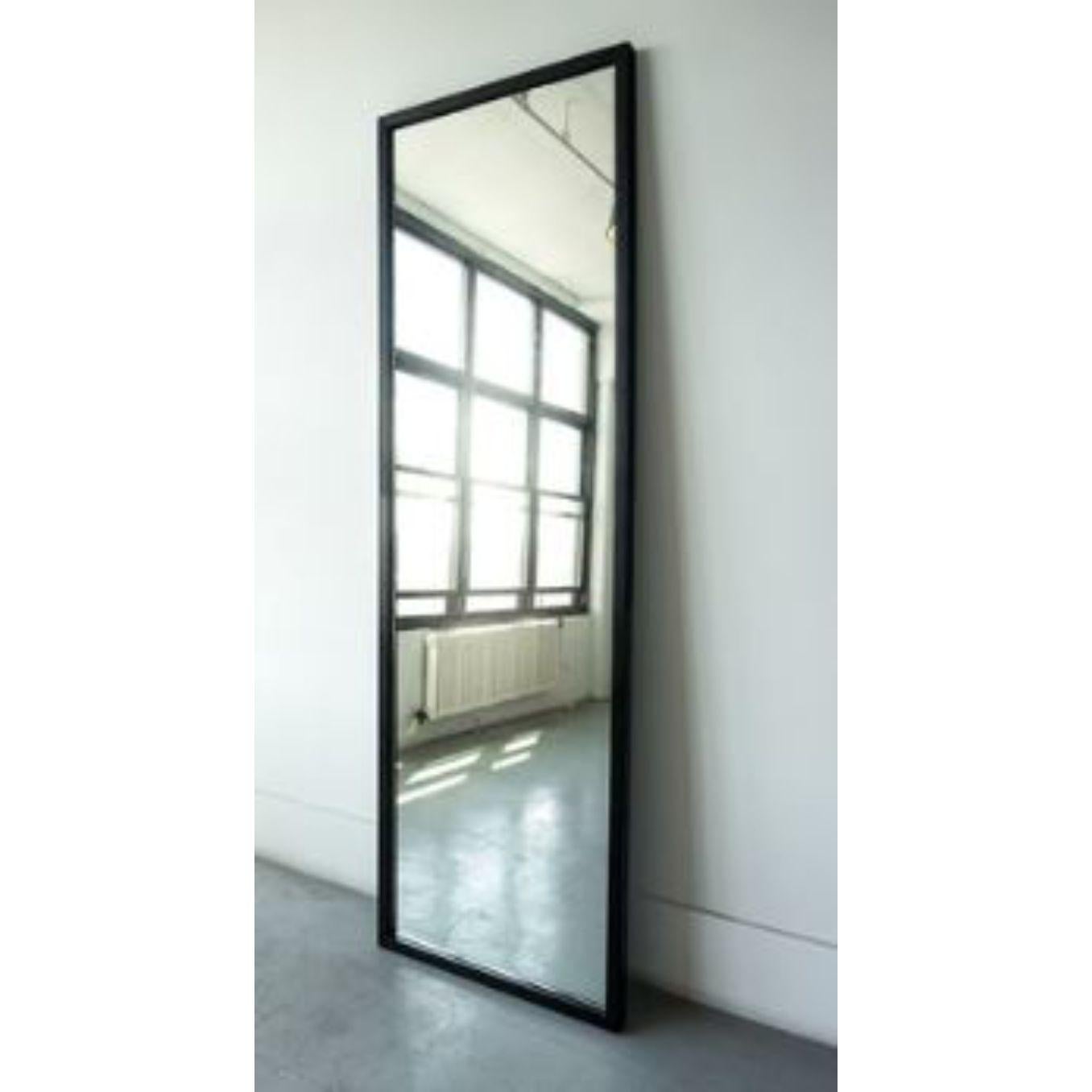 Hansha mirror by Swell Studio
Dimensions: D6 x W79 x H244 cm 
Material: burnt ash, blackened and waxed steel


This piece was inspired by the ponds at the Shinjuku Goyen National Gardens in Tokyo. the top half of the mirror is constructed from