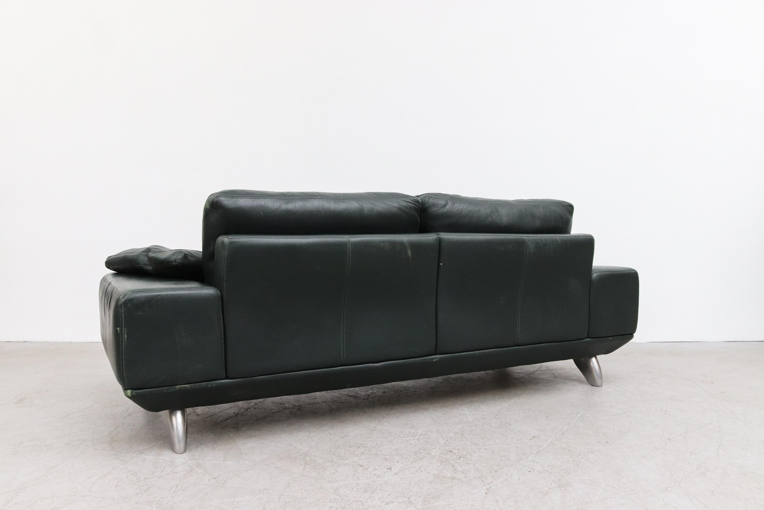 dark green leather couches