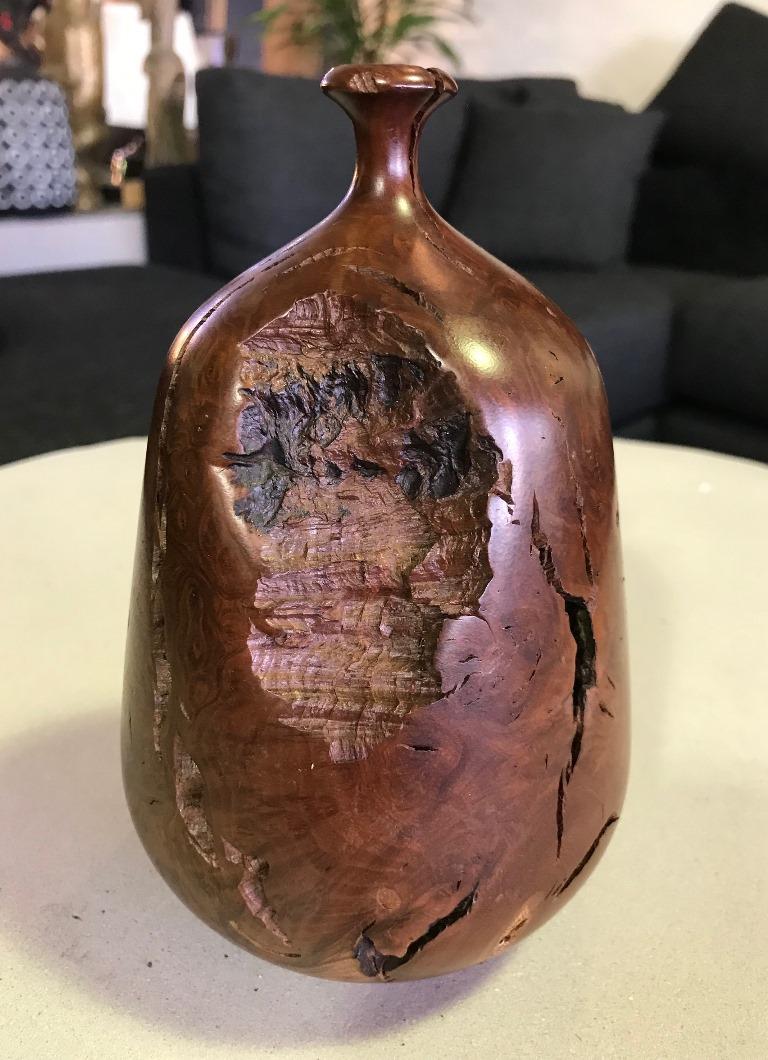 A very unique piece by master wood sculptor/artist Hap Sakwa, widely considered a leader of the wood turning movement in the late 1970s and early 1980s. A quite detailed, solid and eye-catching piece.

Signed and dated (9-78) on base.

Sakwa's