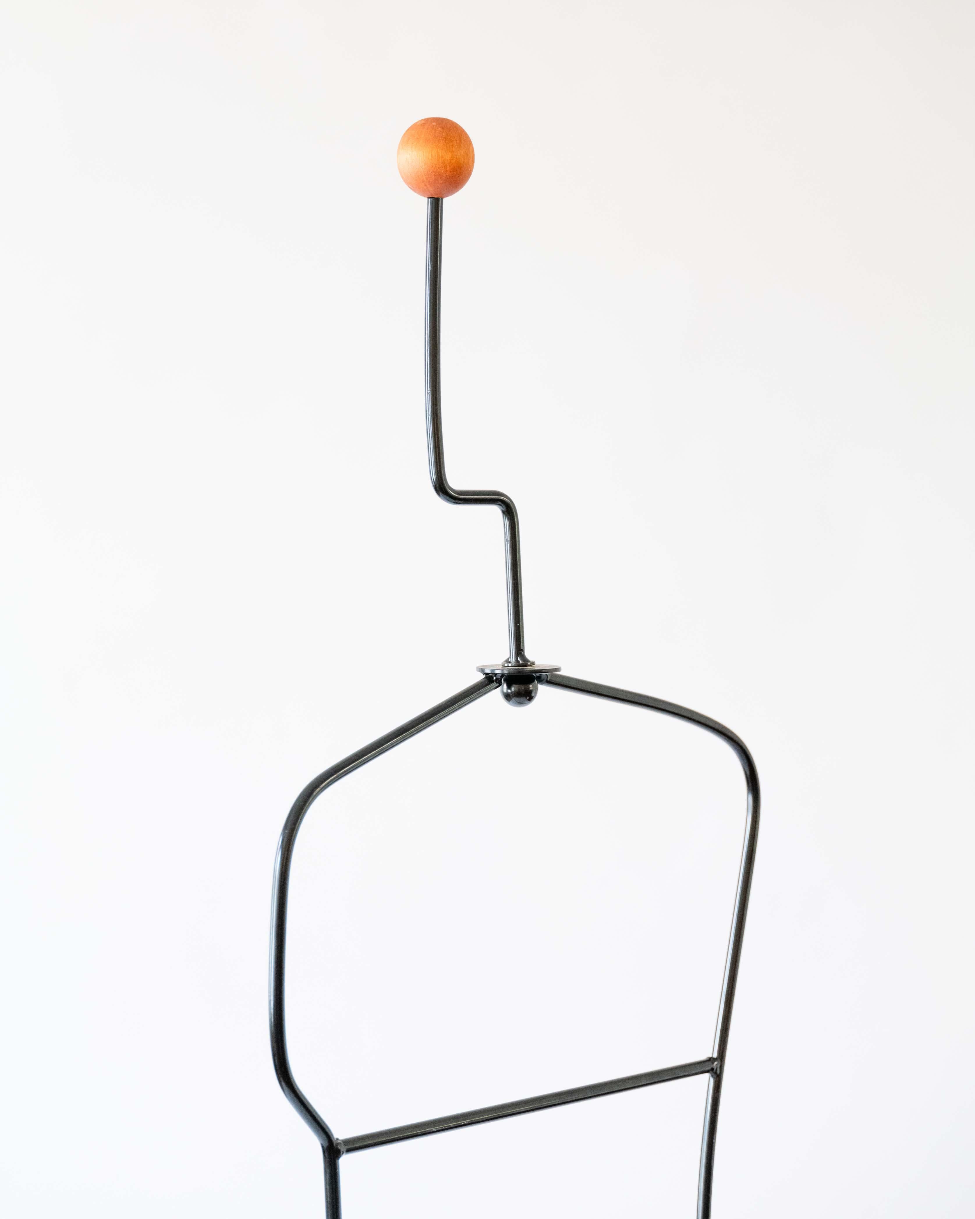 The Häpen Valet Male Mannequin by Ehlen Johansson for IKEA, 1980s, is a striking functional sculpture that blurs the line between furniture and form. Crafted from molded wood and metal, its minimalist silhouette recalls the elegance of Scandinavian