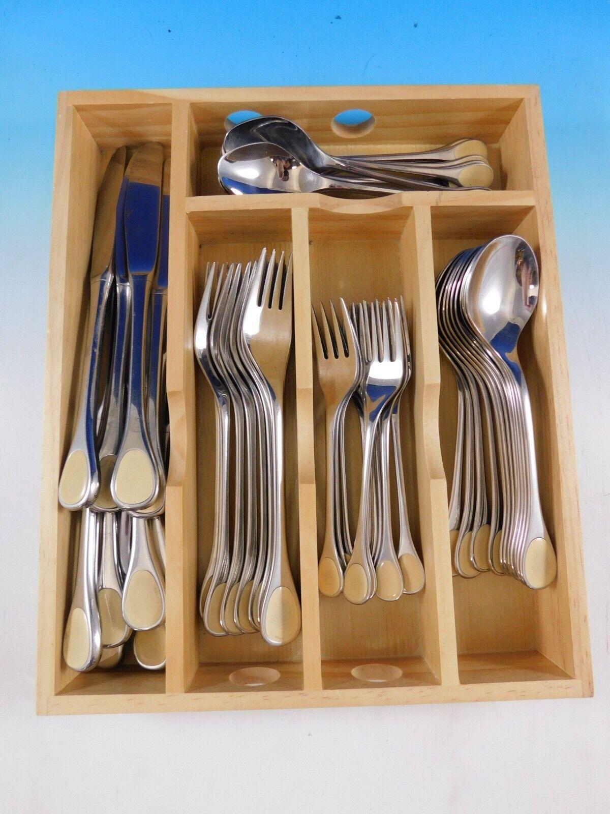 Mid-Century Modern design Happy Day with butterscotch enamel by Furst Furosil (Germany) stainless steel flatware set. This 60 piece set includes:

12 Knives, 8 5/8