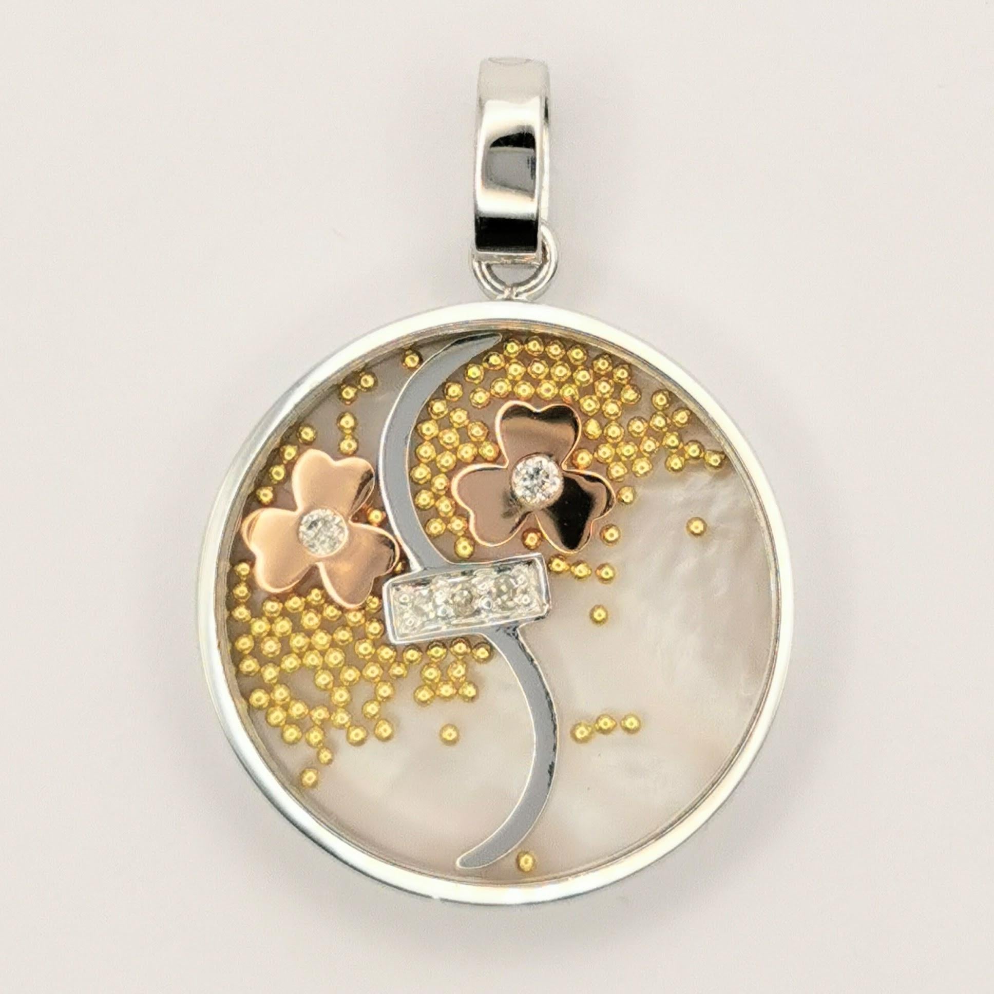 This stunning Happy Diamonds flowers pendant is the perfect choice for anyone looking for a unique and stylish accessory. The pendant itself is made of high quality 18k gold and features a stunning design with tiny yellow gold balls, two rose gold
