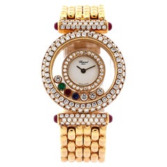 Happy Diamonds Montre à quartz en or jaune avec lunette en diamants et diamants flottants
