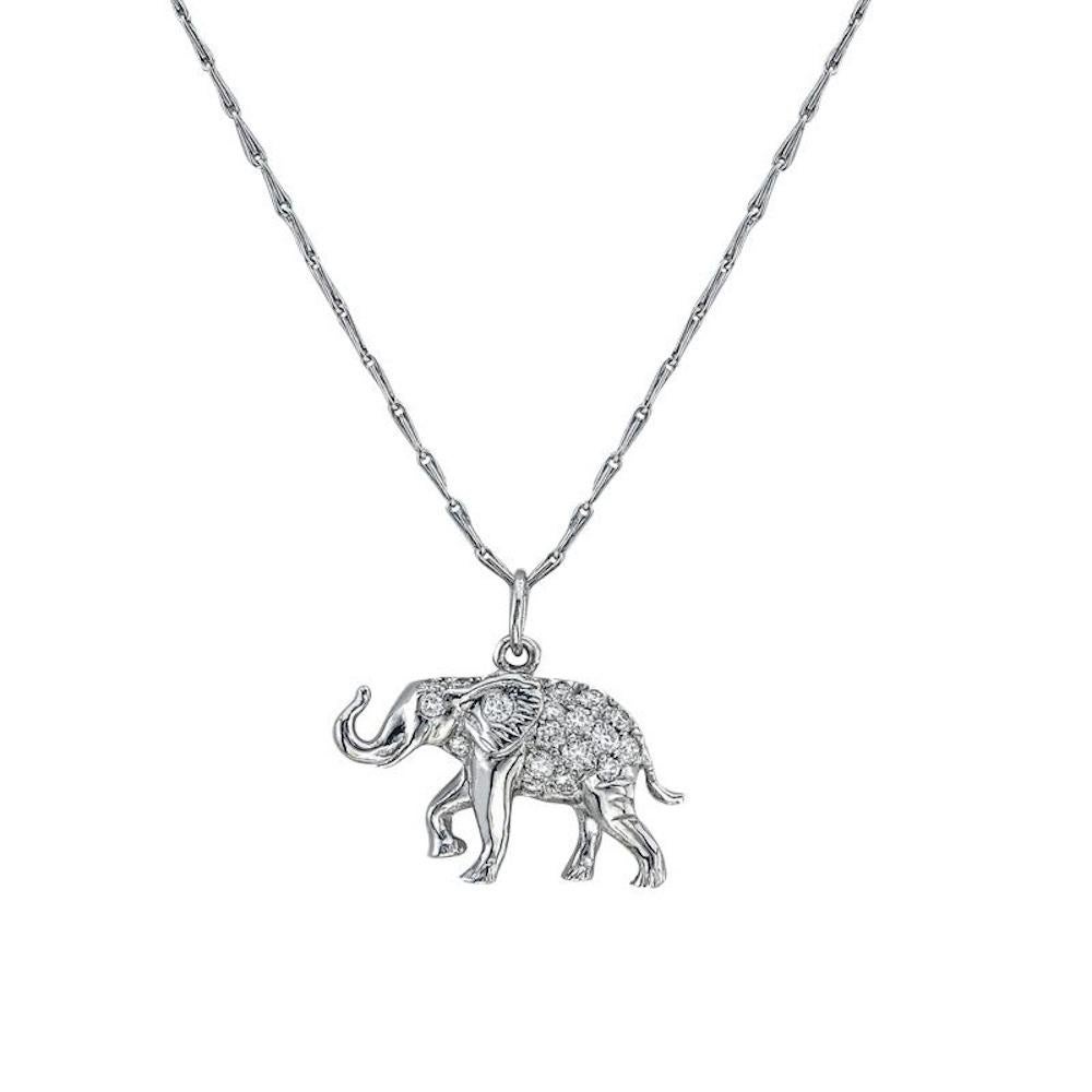 Perfect creation of a running Elephant, made in 18Kt Yellow Gold, set with 20 round diamonds 0.80 carats.
The with of the Elephant is 1 inch(2.7 cm)  Also available in 18Kt White Gold with diamonds.

We manufacture all of our jewelry, in our