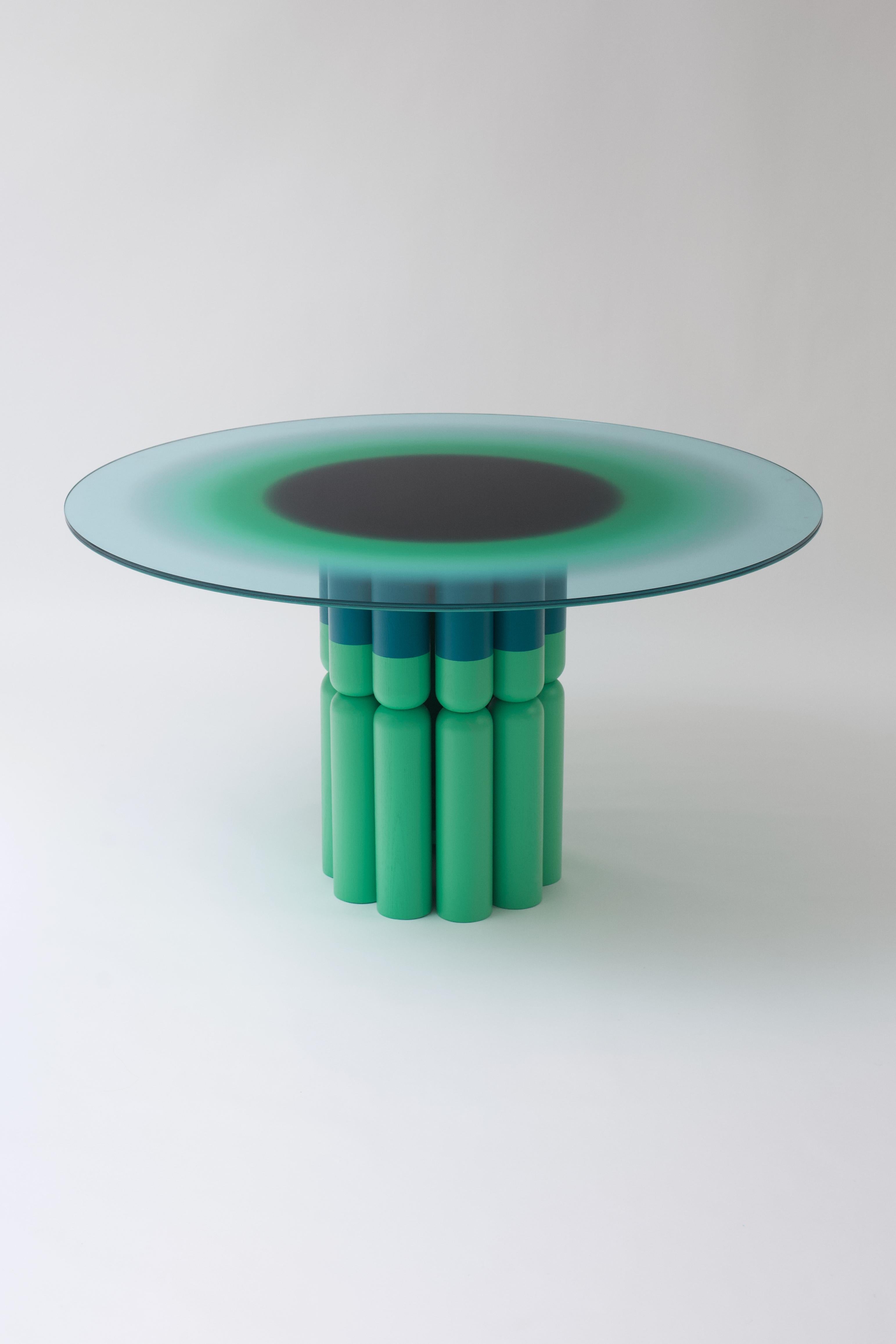 Happy meal, unique dining table by STUDIO YOLK
Dimensions: Ø 130 cm, 72 cm
Materials: Wood and glass top
Unique: One of one

Happy meal is about the energy that is found in and around ingesting a meal, about being in and out of focus and contact,