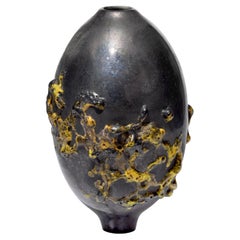 Haptic in Yellow I, dark pewter hued glass textured vessel by Morten Klitgaard