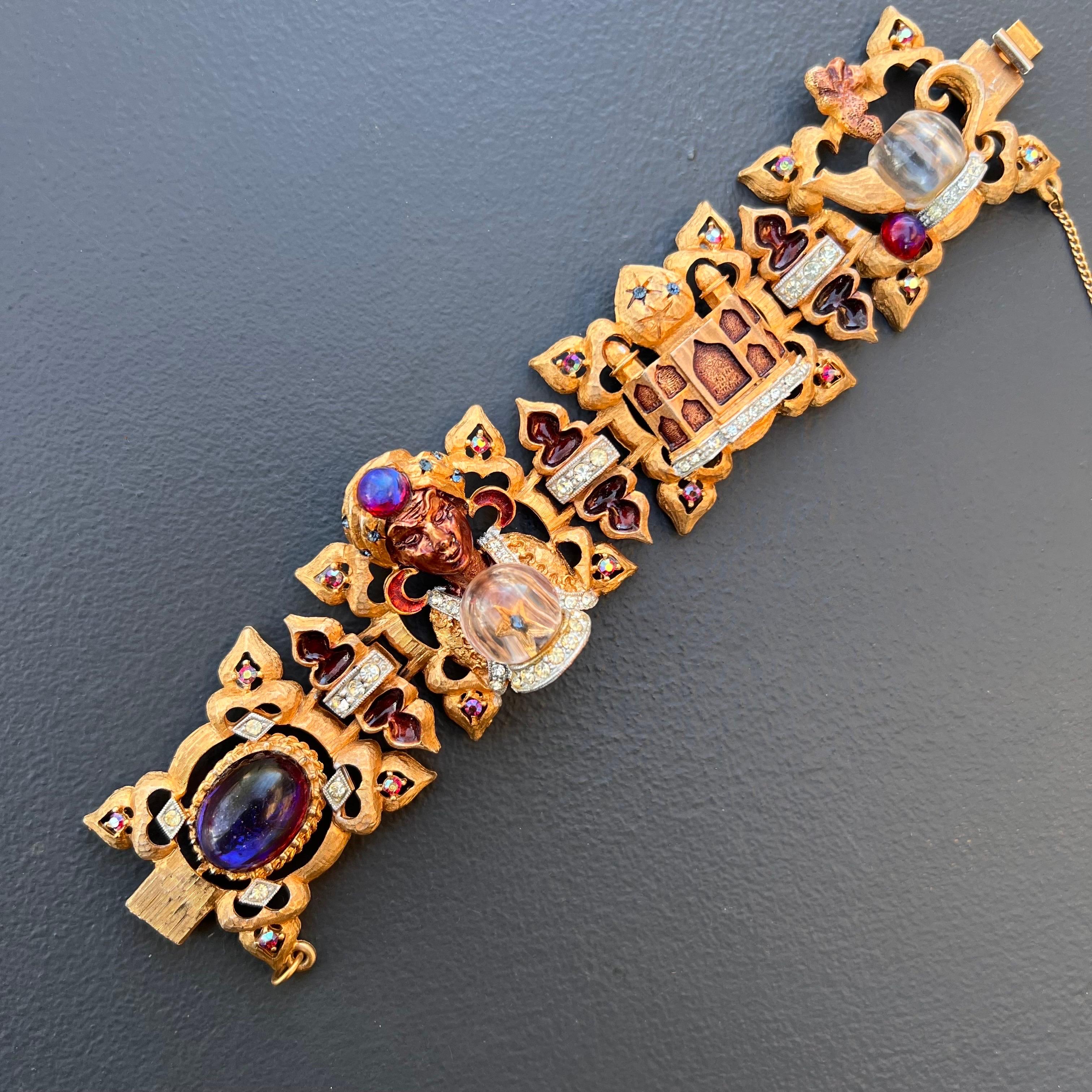 Absolutely stunning vintage 1950's  unmarked HAR bracelet from its Fantasy Series featuring a genie with crystal ball , Taj mahal and what looks like Aladdin's Lamp. Bracelet is very well made in different layers and is adorned with Rhinestones ,