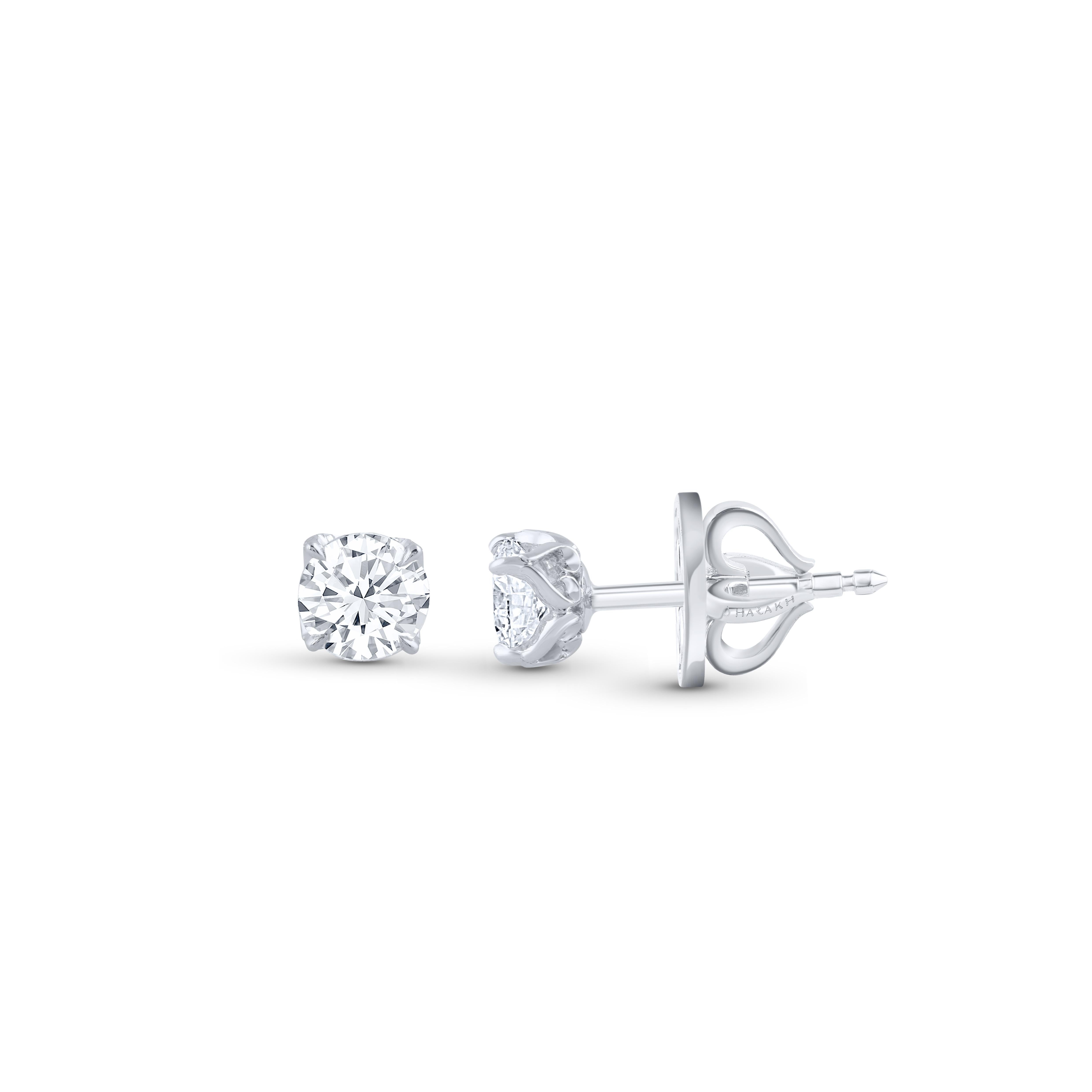 These classic diamond studs showcase a pair of perfectly matched diamonds weighing total 0.60 carats. Crafted in 18 karat white gold, these four prong earrings are available in yellow and rose gold as well.

Perfect for yourself and for gifting as