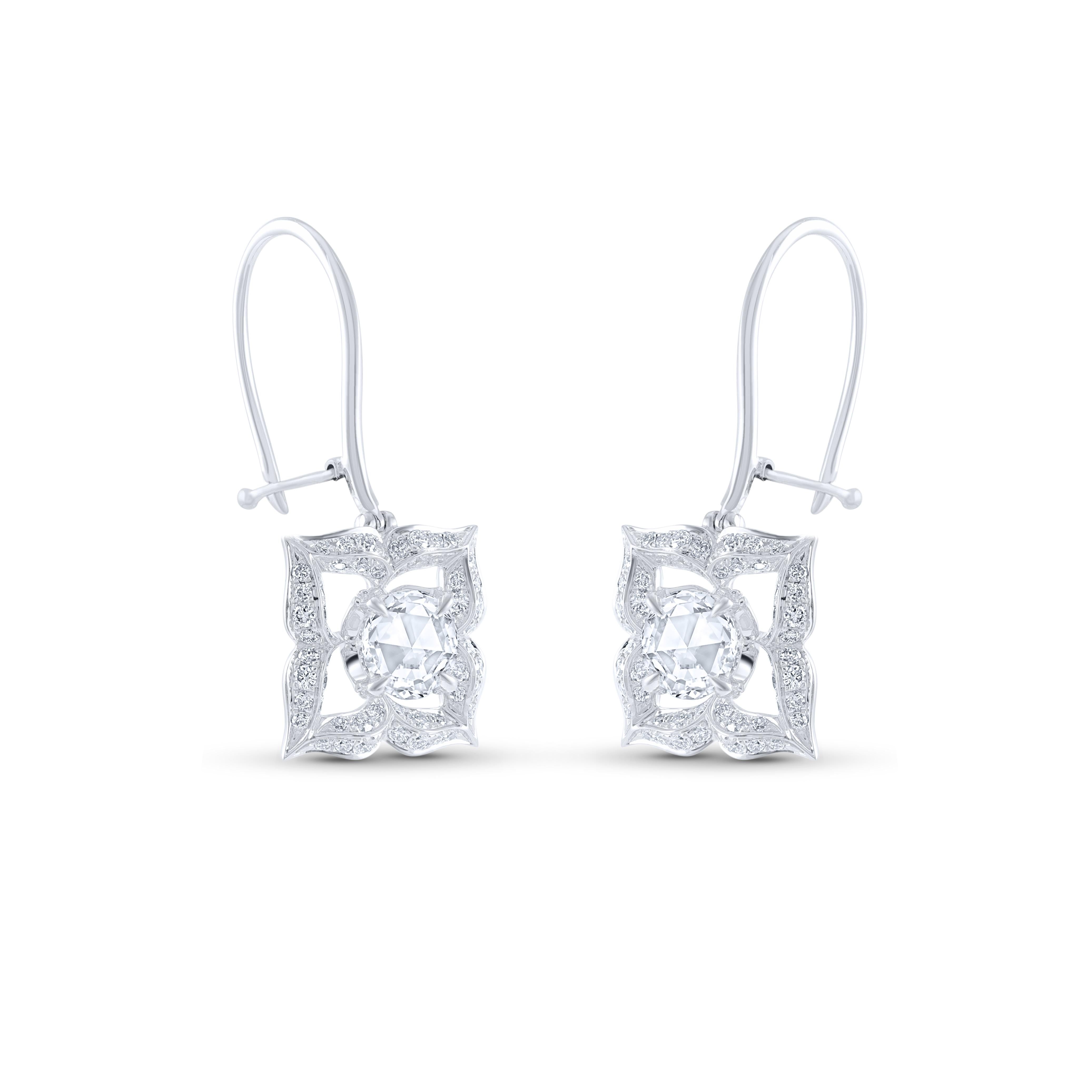 These beautiful earrings are studded with 112 brilliant cut natural diamonds and 2 rose cut round diamond. The total diamond weight of these diamond earrings is 0.95 carats. All the diamonds are D-F color, IF-VS clarity. This white gold earrings