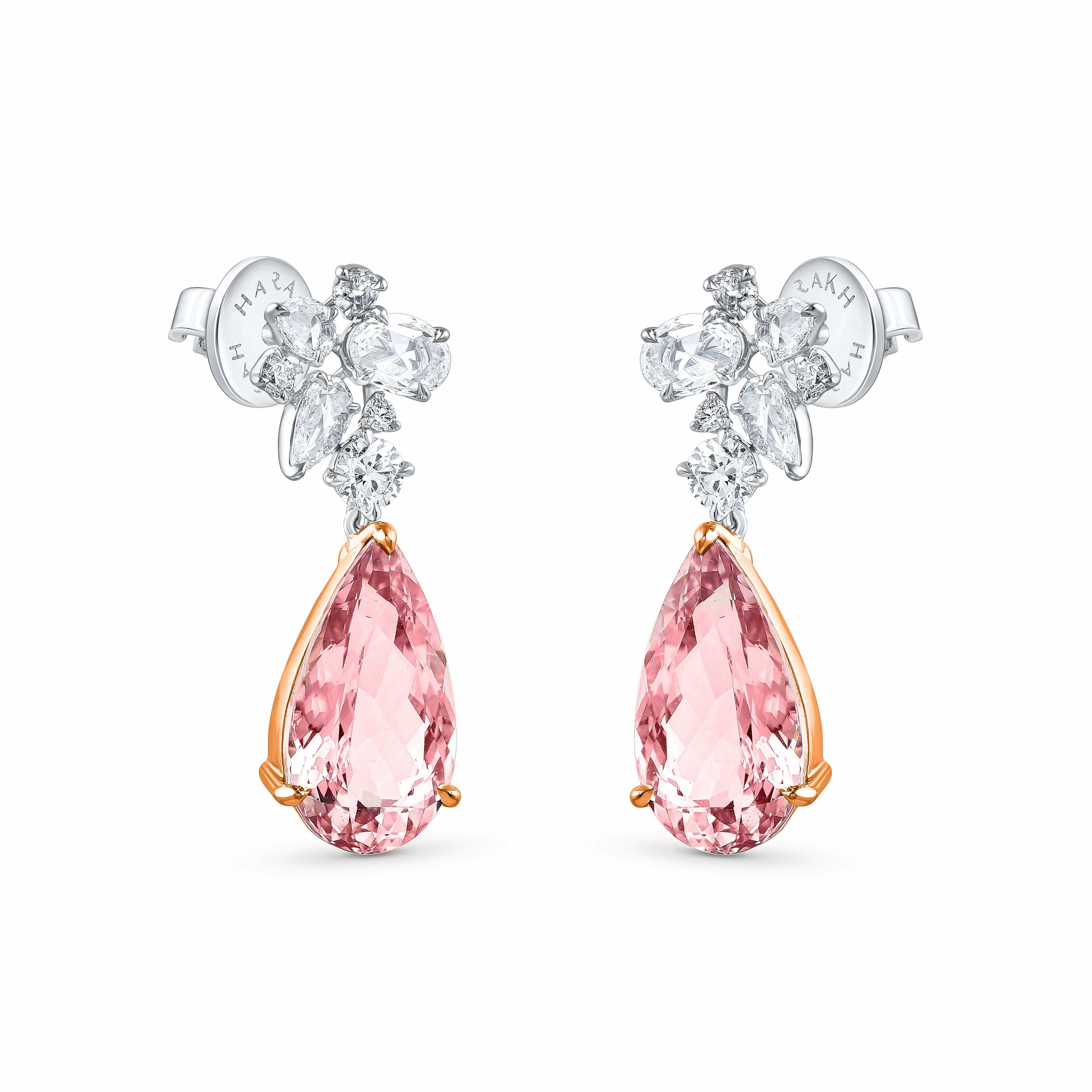 Inspired by the JOY of experiencing a gushing waterfall, these exquisite and elegant dangling earrings from the Cascade Collection are studded with 6 brilliant round cut diamonds, 2 rose-cut marquise, 2 rose-cut pear, 2 rose-cut round, 2 rose-cut