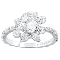 HARAKH Anillo en cascada de diamantes incoloros naturales talla brillante y rosa de 1 1/3 TC