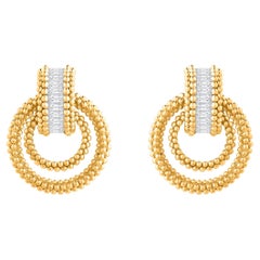 Harakh - Boucles d
oreilles soleil avec diamant baguette incolore de 1/2 carat or 18 carats