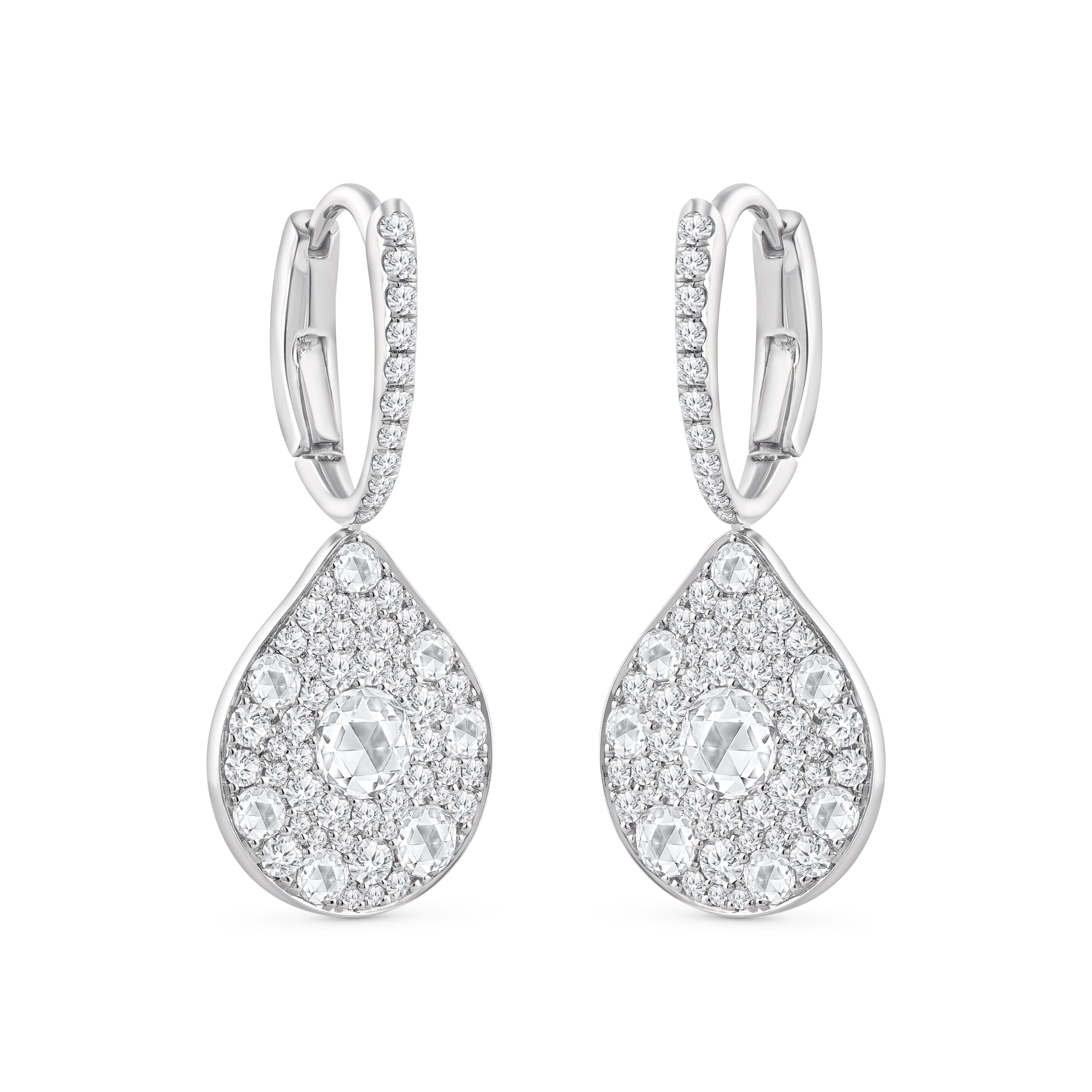Inspired by the JOY of experiencing a gushing waterfall, these exquisite and elegant drop earrings from the Cascade Collection are studded with brilliant cut and rose cut diamonds dripping delicately.

Beautifully designed, these earrings will
