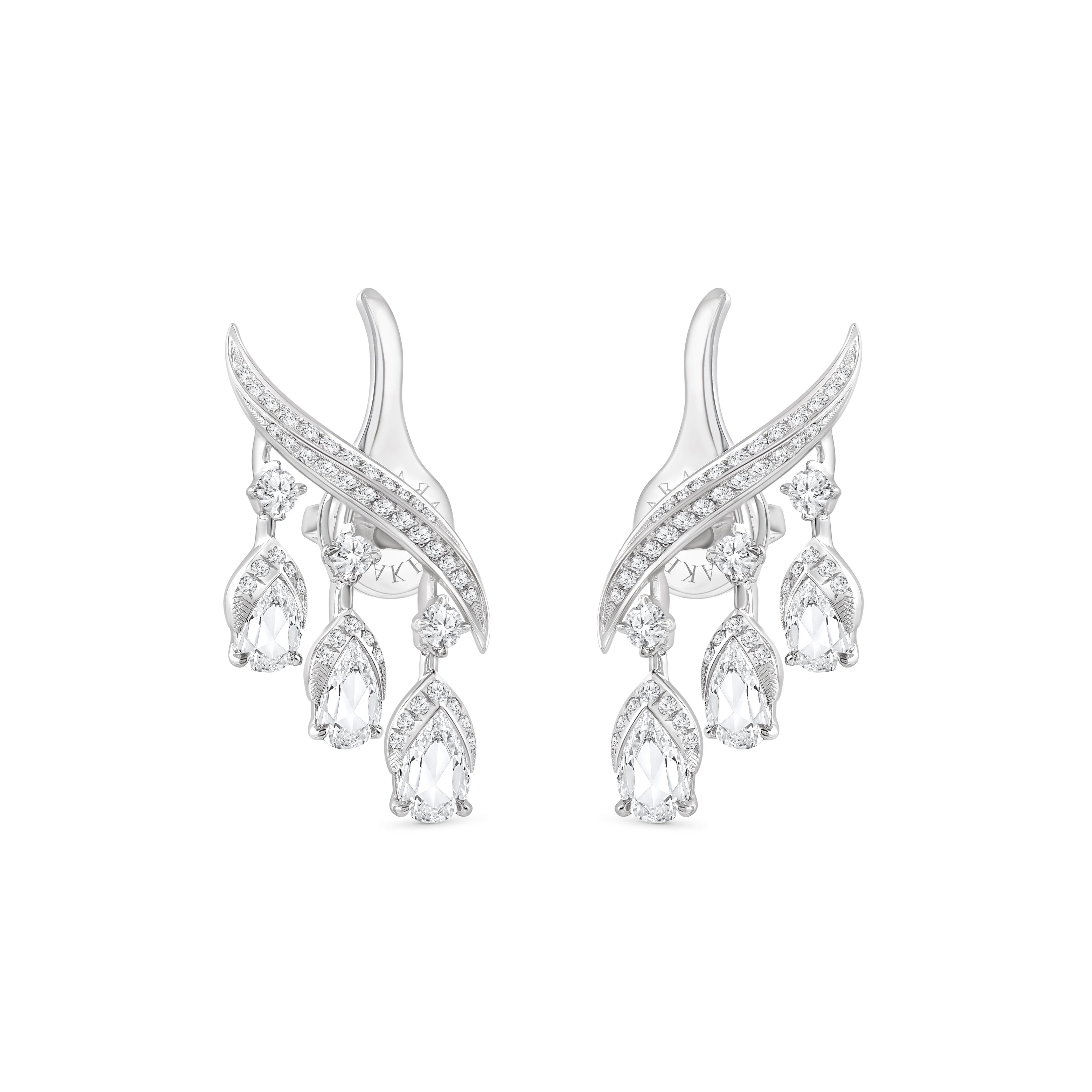 Inspired by the JOY of experiencing a gushing waterfall, these exquisite and elegant dangling earrings from the Cascade Collection are studded with 90 brilliant-cut and 6 rose-cut pear diamonds dripping delicately.

Beautifully designed, these