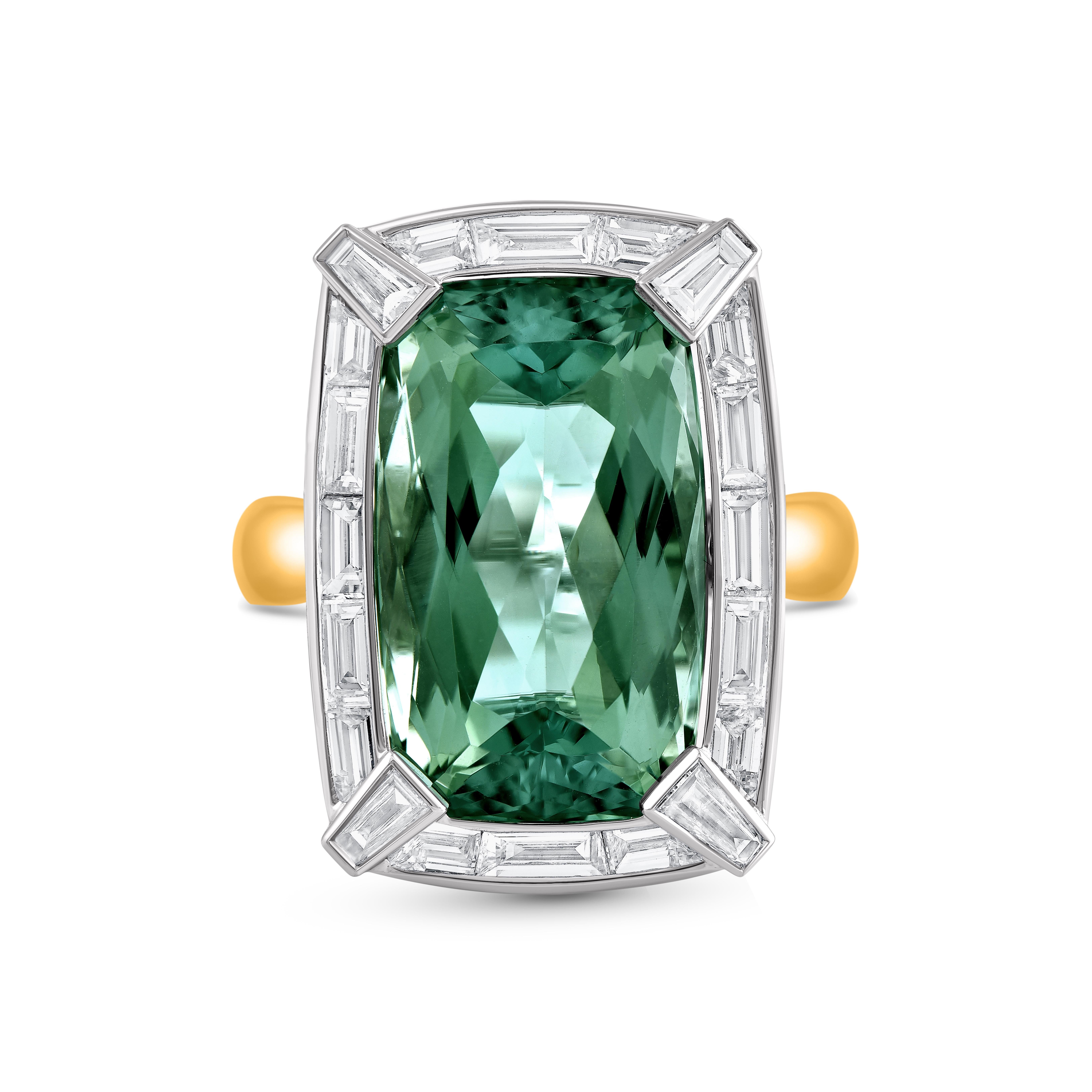 Inspired by the journey of the sun’s rays traveling through space and time to brighten our world, this ring is studded with colorless natural diamonds, baguette diamonds, and natural green tourmaline.

Crafted in 18-karat white and yellow gold, this