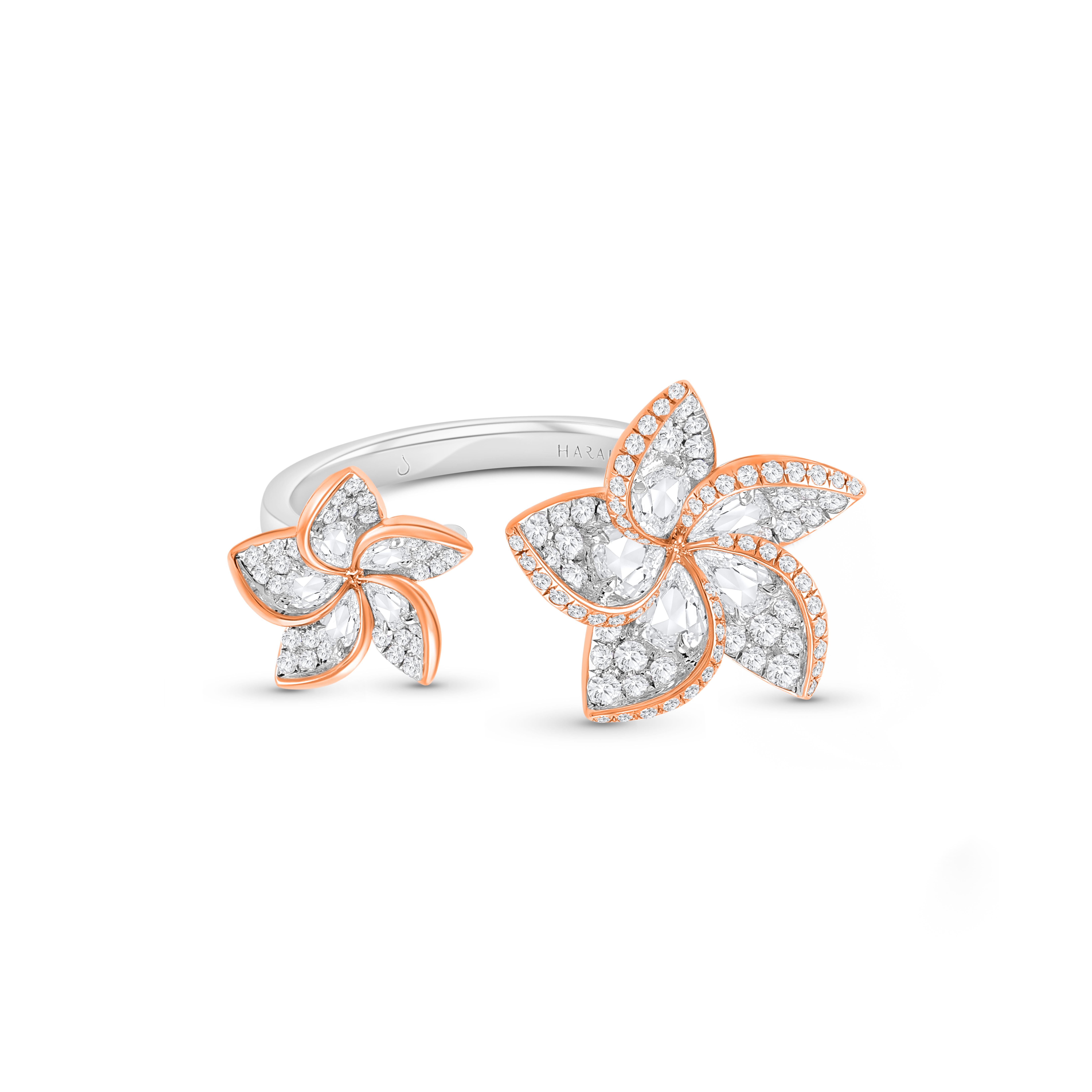 This beautiful floral ring features shimmering pear rose cut diamonds and brilliant round in pave setting resembling petals crafted in 18 karat white and rose gold. The ring is studded with a total of 115 brilliant cut and 10 rose cut pear diamonds