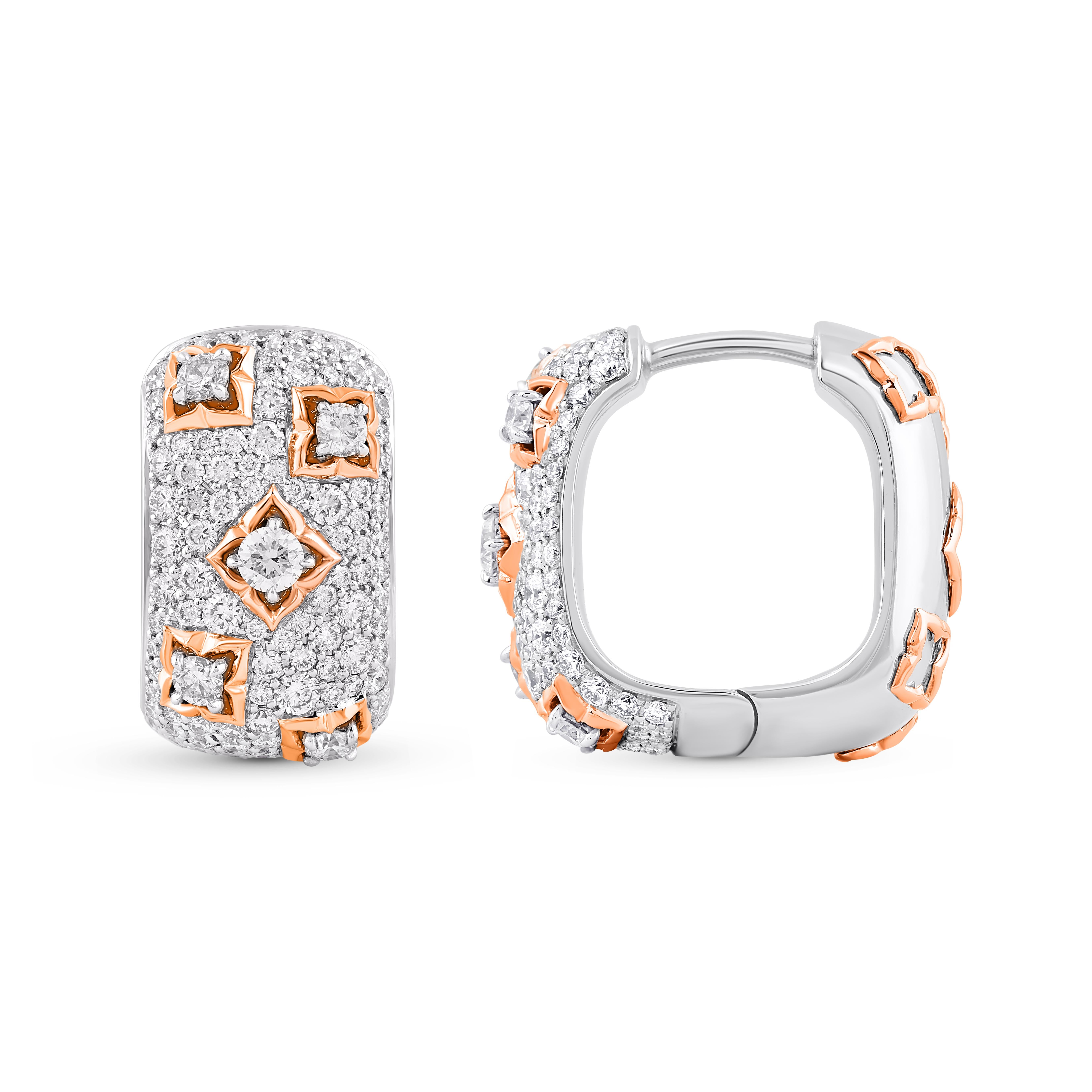 Inspired by the sacred symbols to invoke divinity, these elegantly designed hoop earrings are studded with 216 brilliant round-cut natural  diamonds in prong setting, beautifully crafted in 18 KT White and Yellow gold. Our diamonds are graded as F