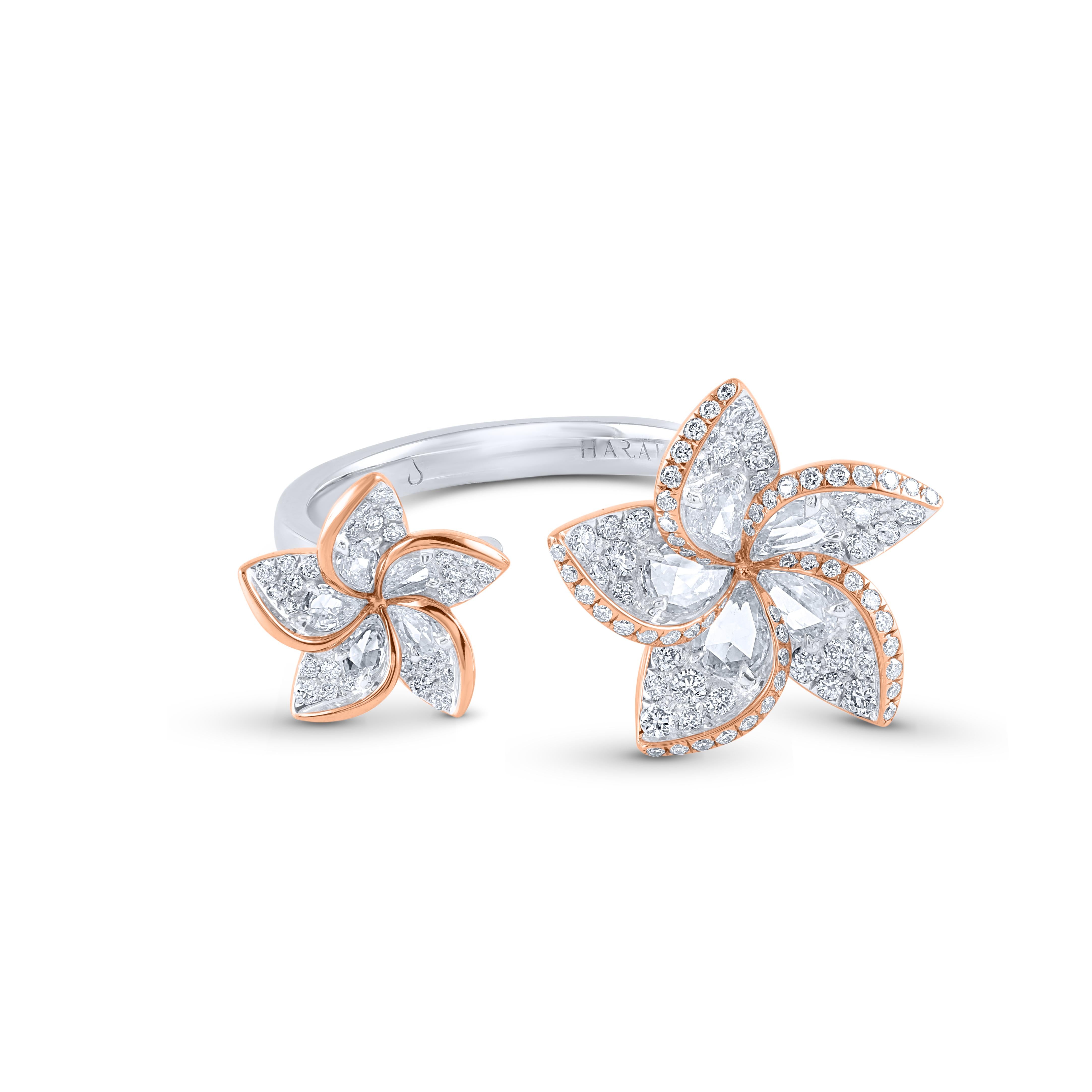 This beautiful floral ring features shimmering pear rose cut diamonds and brilliant round in pave setting resembling petals crafted in 18 karat white and rose gold. The ring is studded with a total of 115 brilliant cut and 10 rose cut pear diamonds