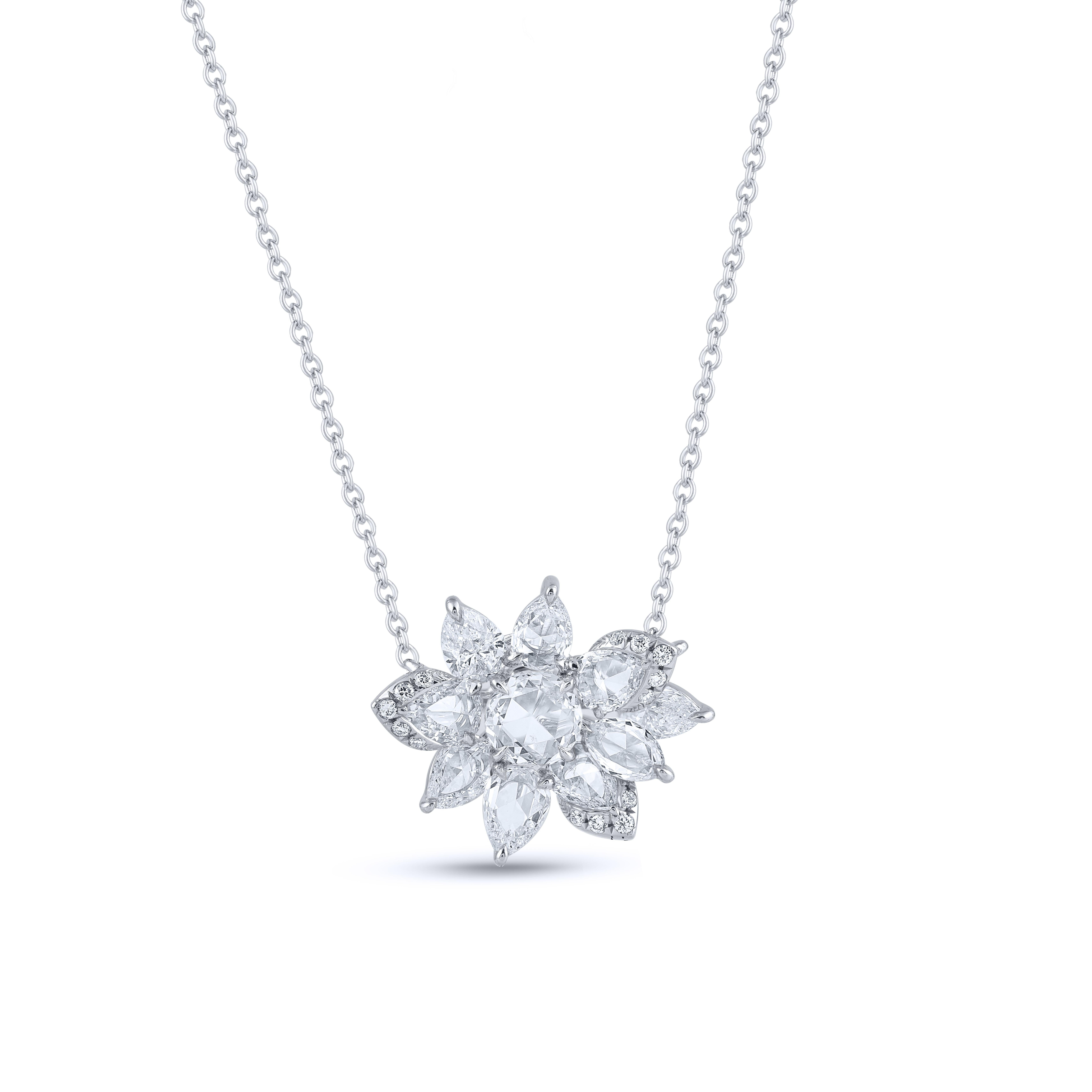 Inspired by the JOY of experiencing a gushing waterfall, these exquisite and elegant necklace from the Cascade Collection are studded with 4 Brilliant cut Pear Diamonds, 17 Brilliant Round Diamonds, 1 Rose cut Marquise, 6 Rose Cut Pear and 1 Rose