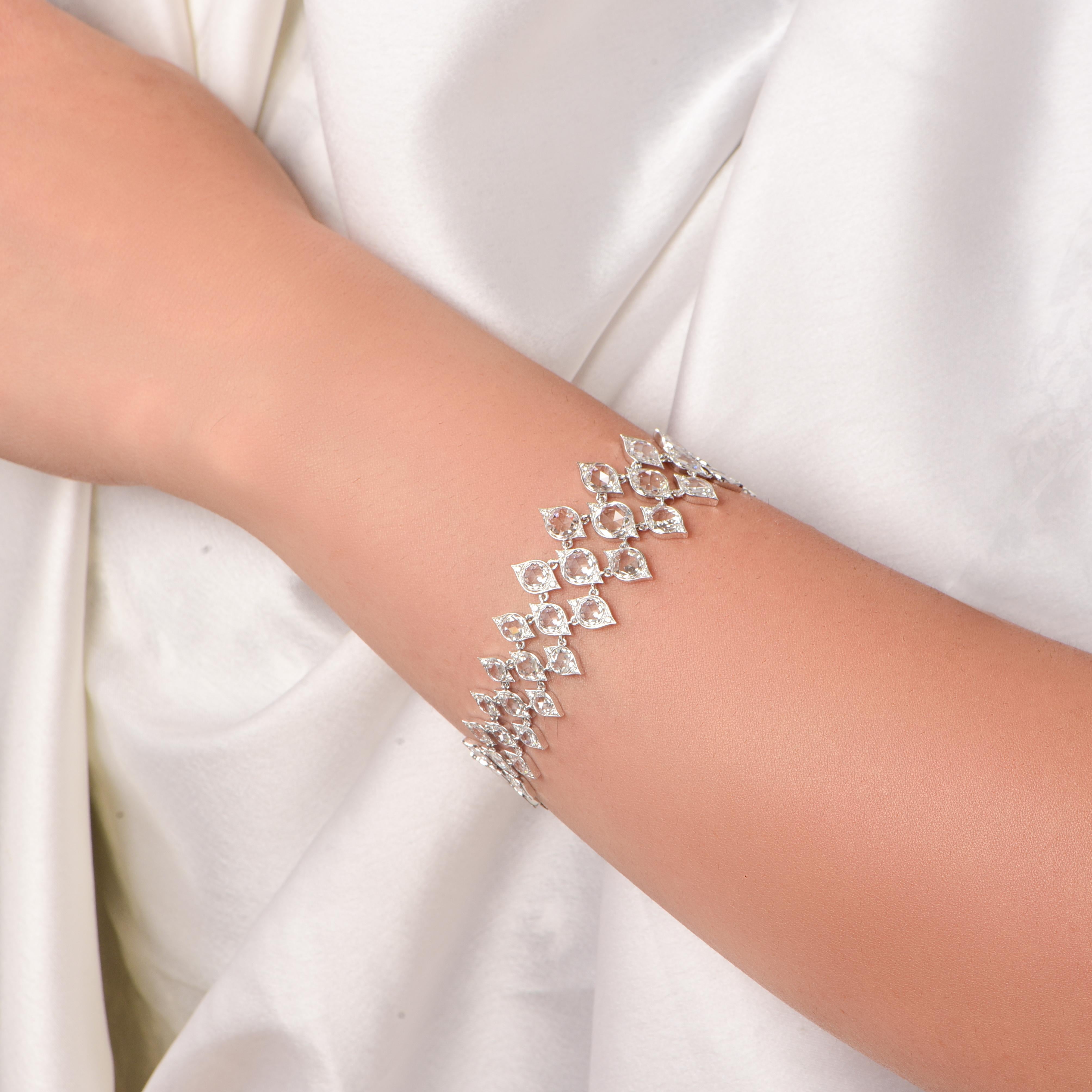 This elegant bracelet from our Haveli collection is studded with brilliant and rose cut diamonds. It is studded with 182 brilliant cut, 72 rose cut round diamonds, crafted to perfection. The diamonds are graded as D-F color and IF-VS clarity. 

This