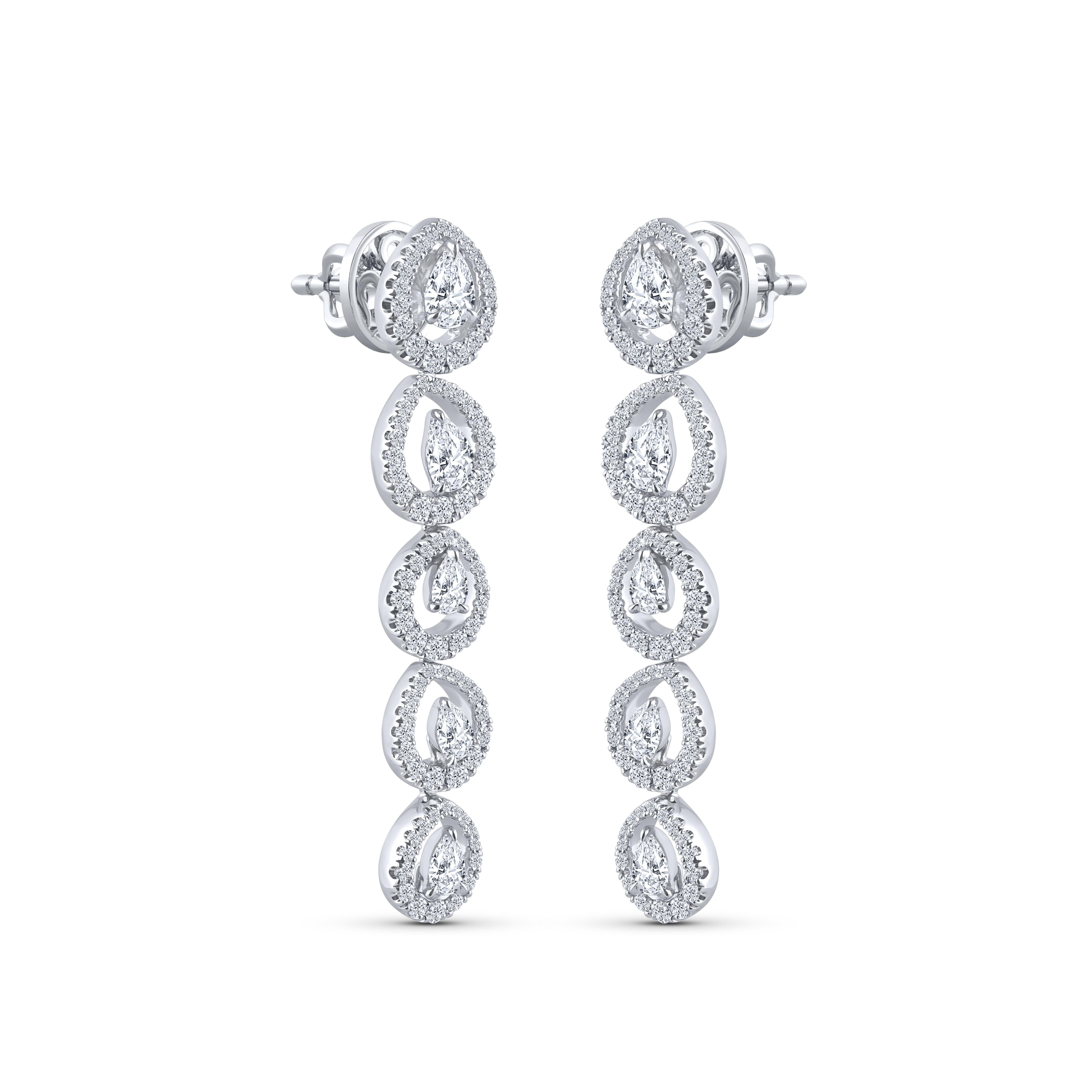 These contemporary dangling earrings are studded with a total of 182 diamonds – 172 brilliant cut and 10 pear diamonds. These diamonds are graded as D-F color and IF-VS clarity. 

These earrings are a part of our Raindrop Collection – which