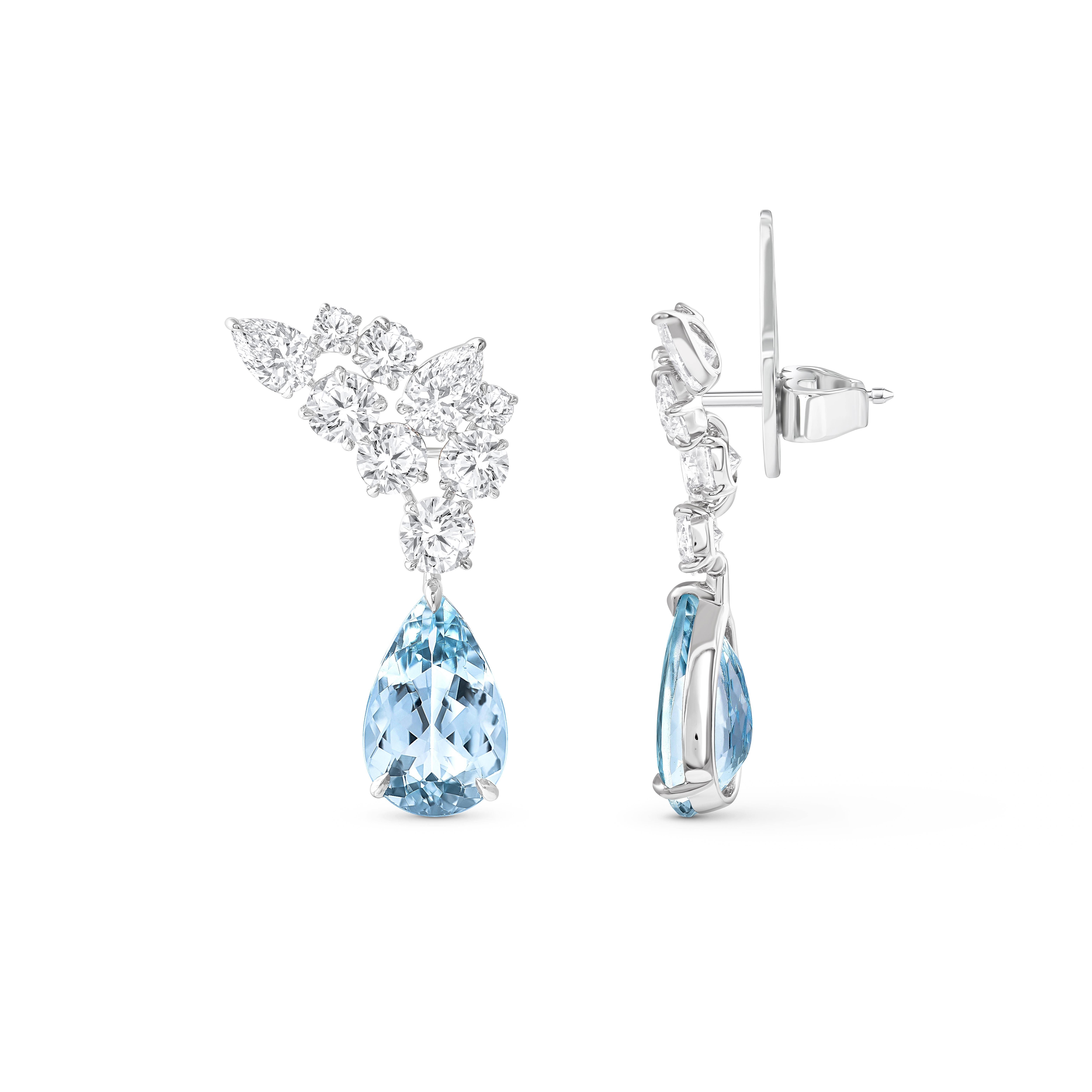 Inspired by the JOY of experiencing a gushing waterfall, these stunning earrings from the Cascade Collection features 4 pear-cut diamond, 14 round cut colorless diamonds and 2 pear aquamarine. These dressy earrings are perfect for the festive