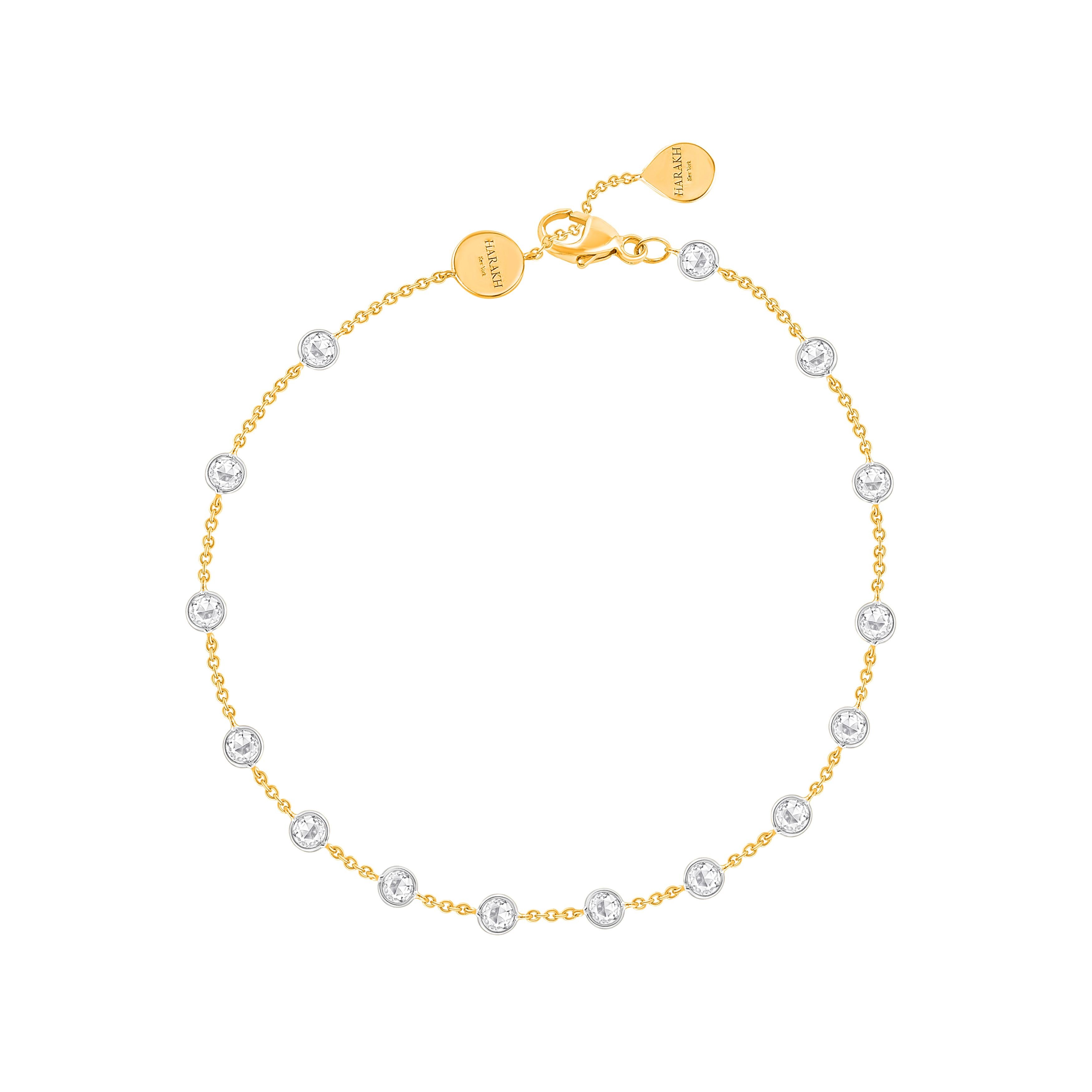 Inspired by the JOY of experiencing a gushing waterfall, this elegantly designed bracelet is studded with 1/2 carat natural rose cut colorless diamonds in a prong setting, beautifully crafted in 18 KT White and Yellow gold. Our diamonds are graded