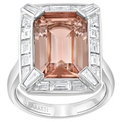 HARAKH Anillo Luz Solar de Oro de 18 KT con Diamante Incoloro y Turmalina Marrón Naranja