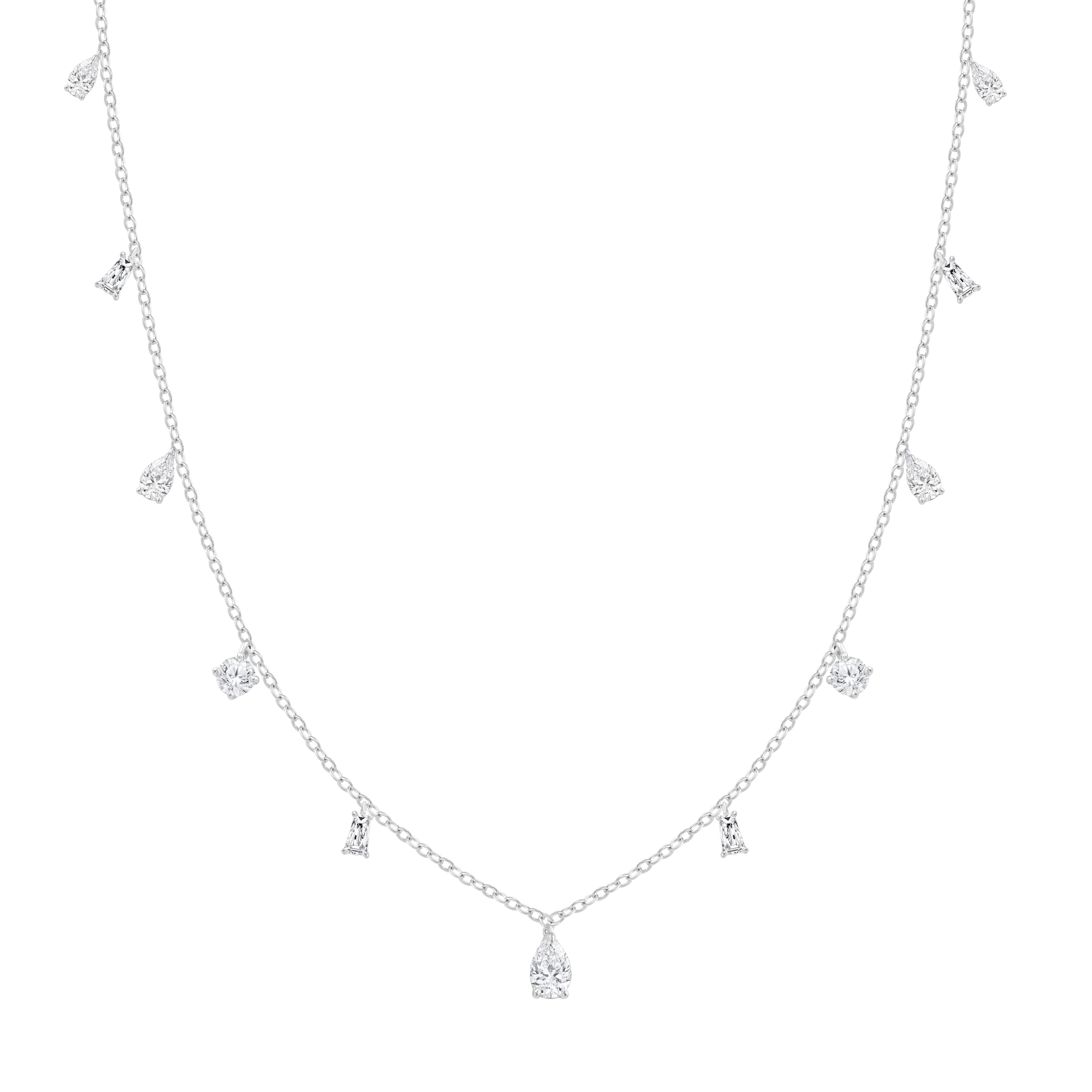Inspired by the enchanting rhythm of dancing in a long-awaited monsoon, this tassel necklace from our Raindrop Collection shimmers with the brilliance of round diamonds. The Raindrop Necklace is a graceful composition crafted in 18KT white gold.
