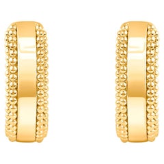 HARAKH Orecchino Huggie in oro giallo 18KT con luce solare