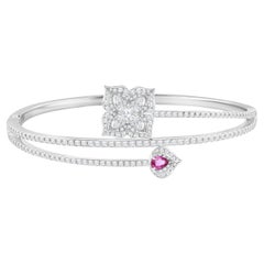 HARAKH Brazalete Remolino Mandala de Diamantes Incoloros y Rubíes de 2 1/2 CT en Oro de 18 KT