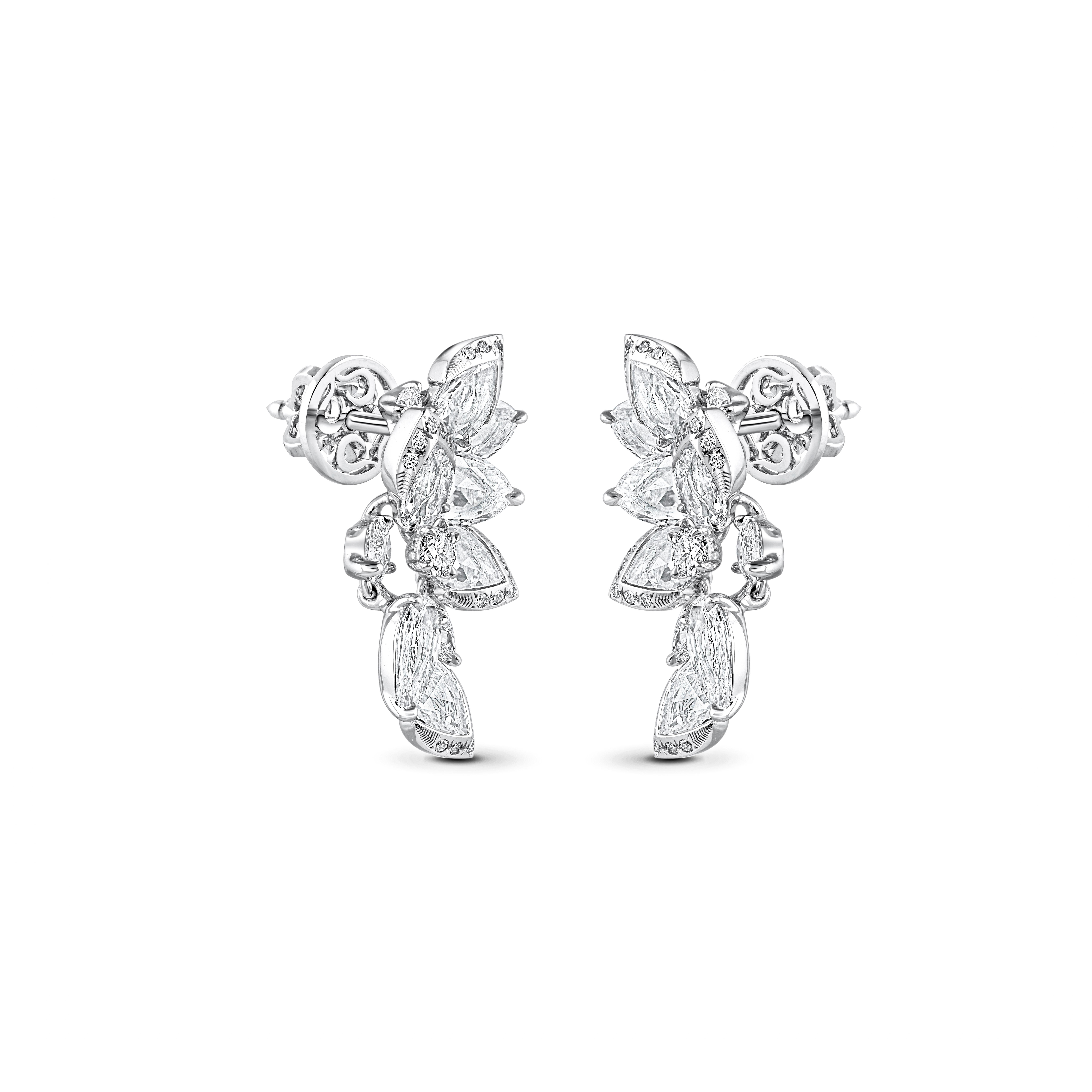 Inspired by the JOY of experiencing a gushing waterfall, these cascade earrings are studded with 4 pear-cut diamonds, 44 brilliant around-cut and 14 rose-cut pear diamonds dripping delicately. The diamonds are graded as F color and VS2 clarity. The