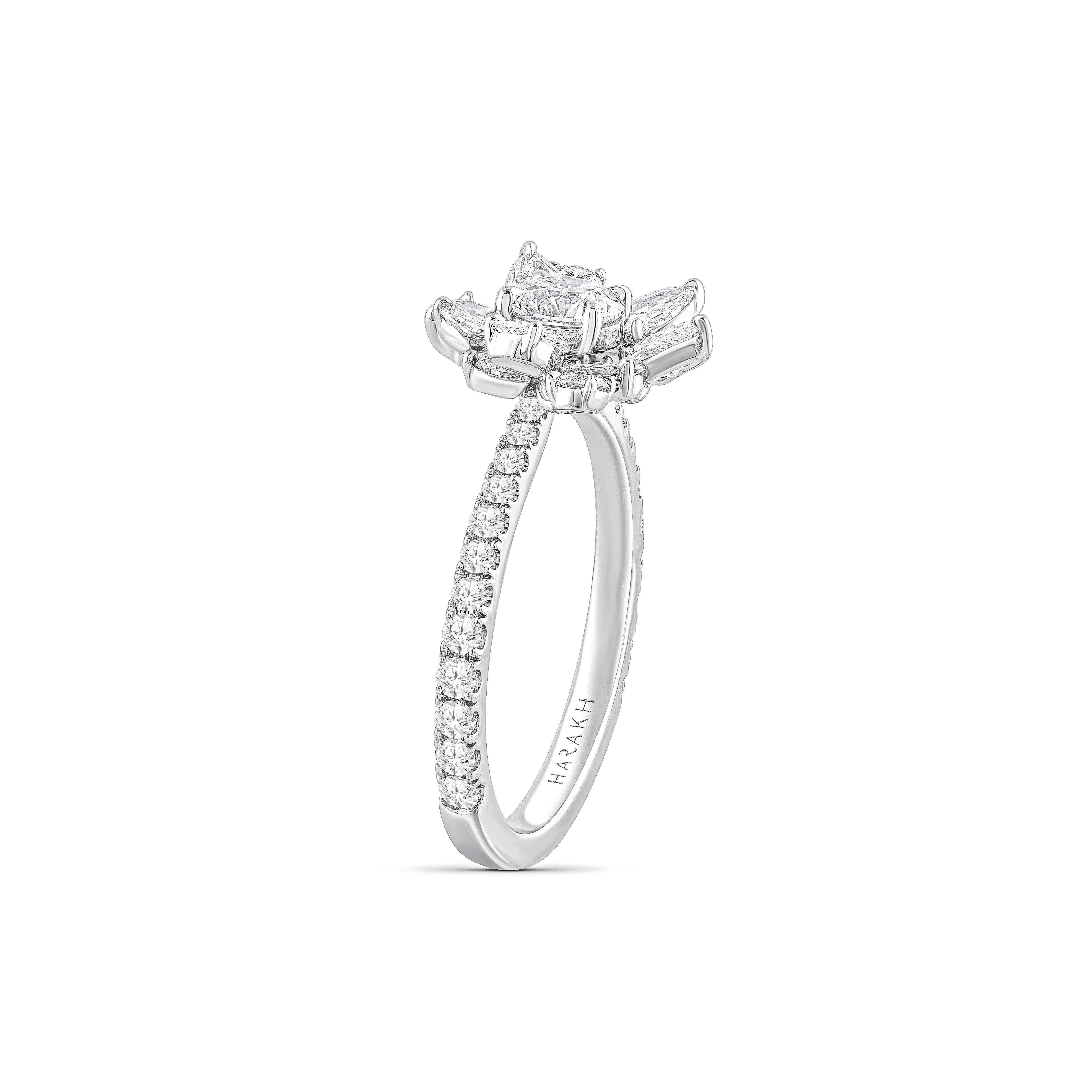 Inspired by the JOY of experiencing a gushing waterfall, this exquisite and elegant cluster ring from the Cascade Collection is studded with 2 pear brilliant cut, 28 round brilliant cut, 2 rose cut pear, and 4 rose cut round diamonds dripping