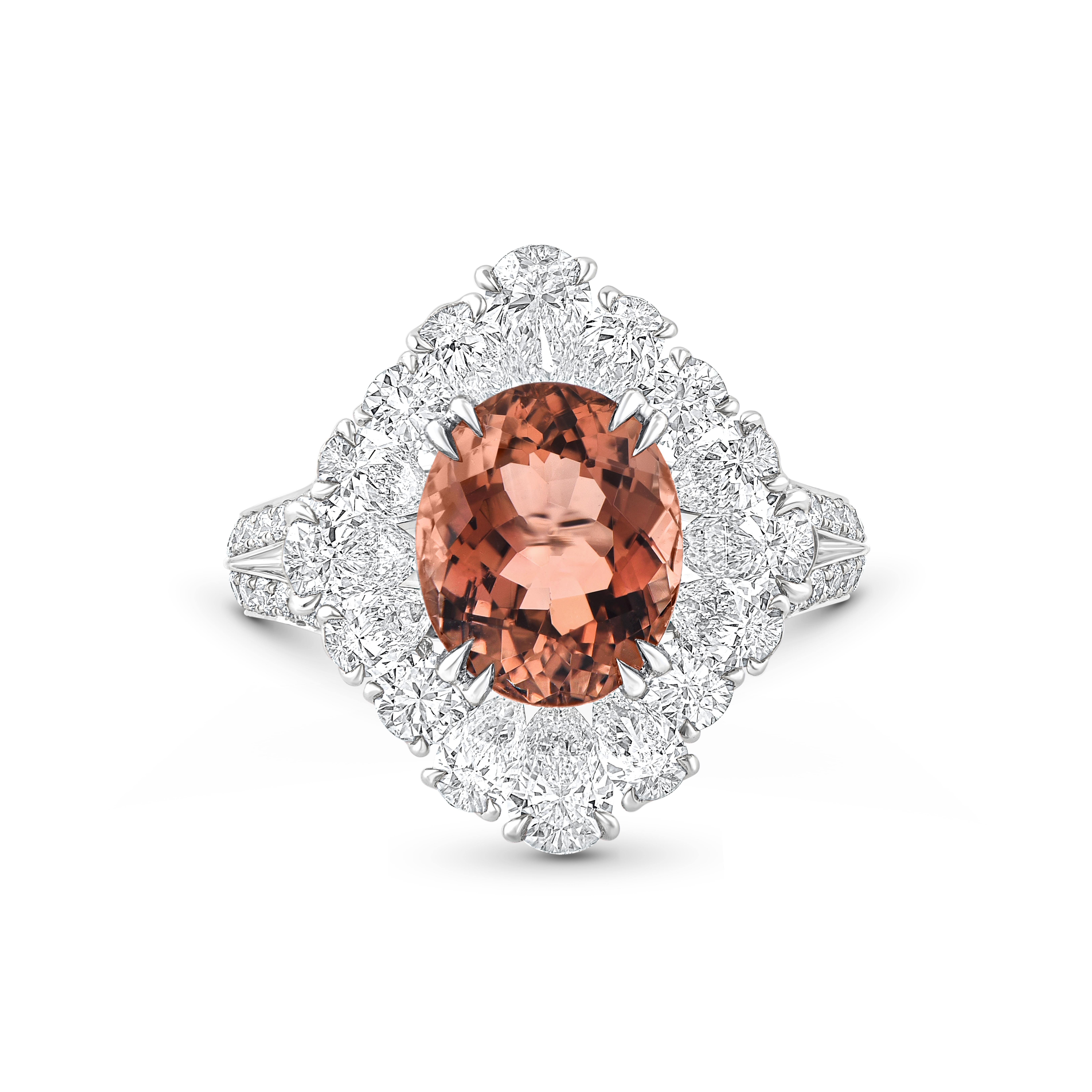 Inspired by the magic of dancing in a long-awaited monsoon, this exquisite and elegant ring from the Raindrop Collection captures the poetic beauty of nature’s rhythm. Crafted in 18KT white gold, it features a stunning natural orangy-brown