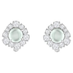 Harakh Boucle d
oreille en or 18KT avec diamant incolore et tourmaline verte en Cascade Harakh Boucle d
oreille en or 18KT avec diamant incolore et tourmaline verte en Cascade