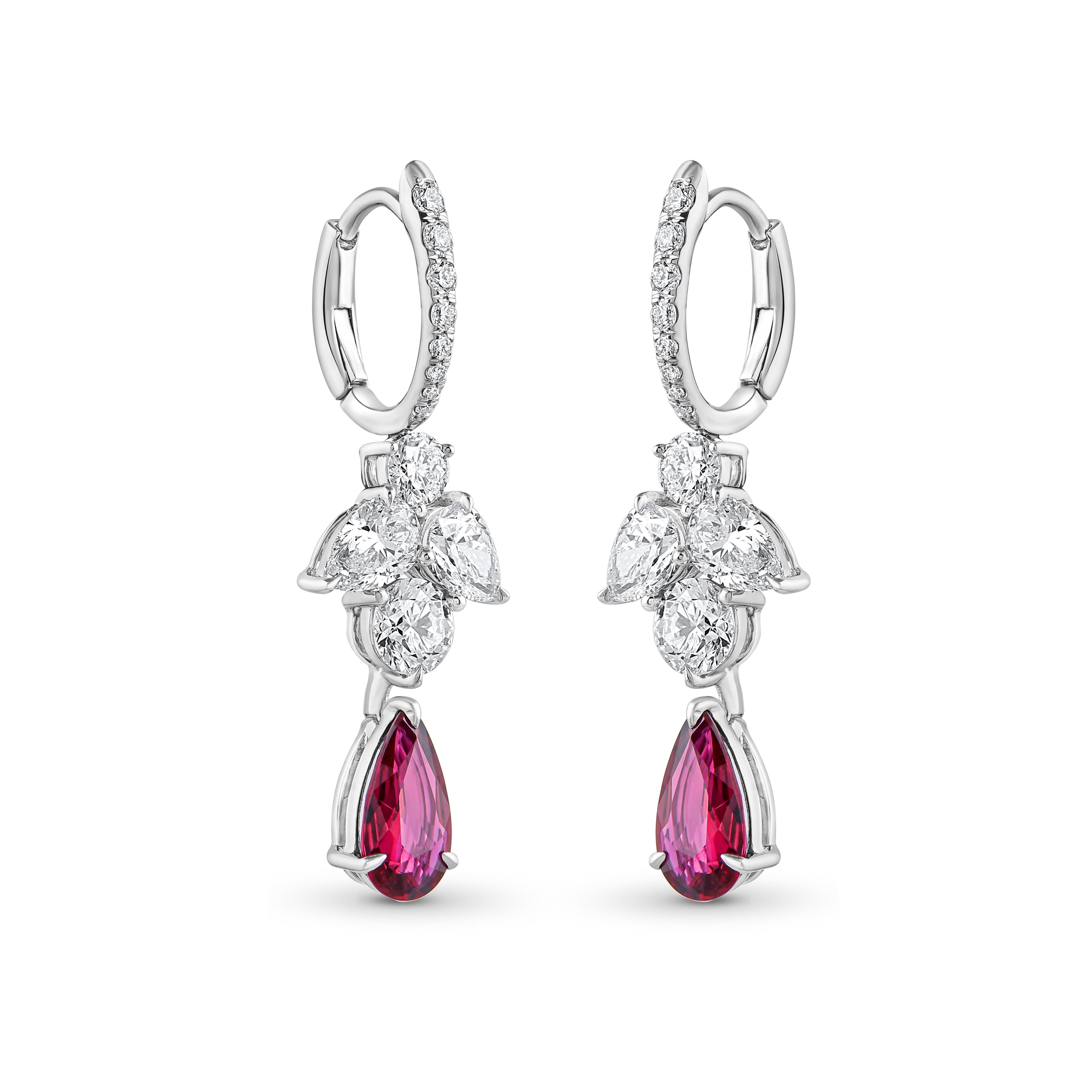 Inspired by the JOY of experiencing a gushing waterfall, these exquisite and elegant dangling earrings from the Cascade Collection are studded with brilliant cut diamonds and ruby dripping delicately.

Beautifully designed, these earrings will