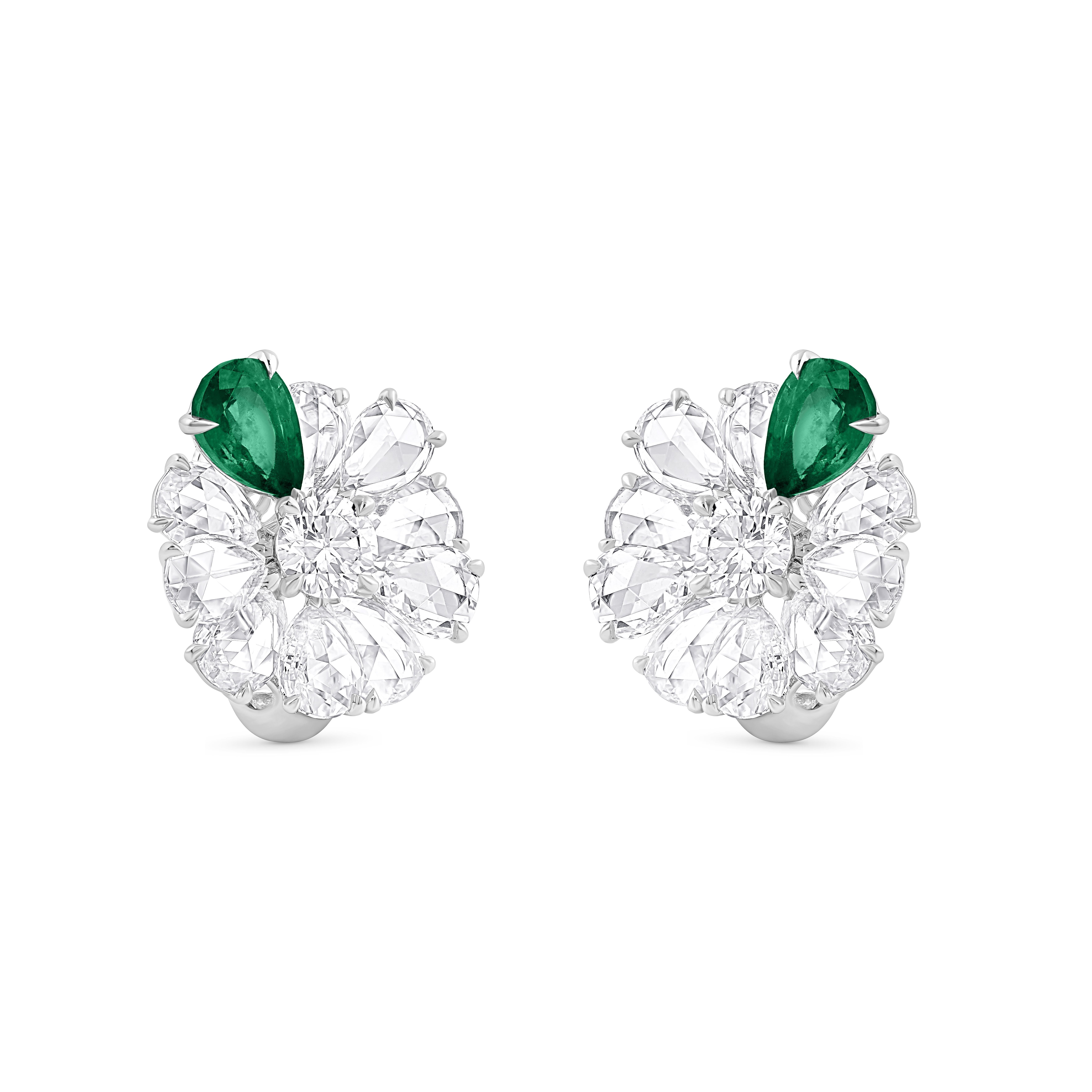 Inspiriert von der Freude an einem rauschenden Wasserfall sind diese exquisiten und eleganten Ohrstecker aus der Collection'S Cascade mit 2 Smaragden im Birnenschliff, 18 Diamanten im Rosenschliff und 2 Diamanten im Brillantschliff besetzt, die zart