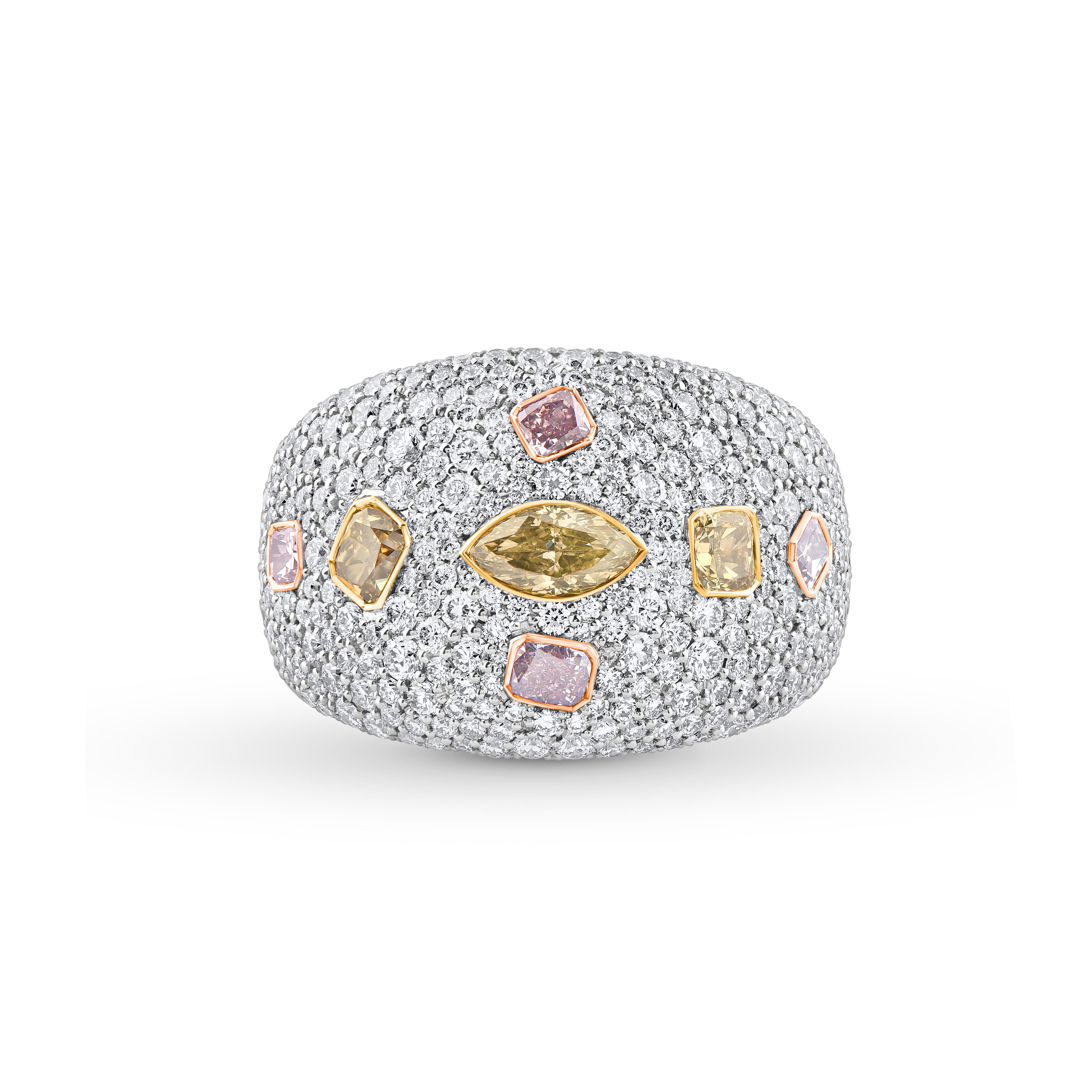 Inspired by the magic of dancing in a long-awaited monsoon, this statement ring is studded with cuts of multi-shaped colorless diamonds and yellow diamonds. Crafted in a medley of 18KT white, rose, and yellow gold, gleaming with a generous 5 5/8