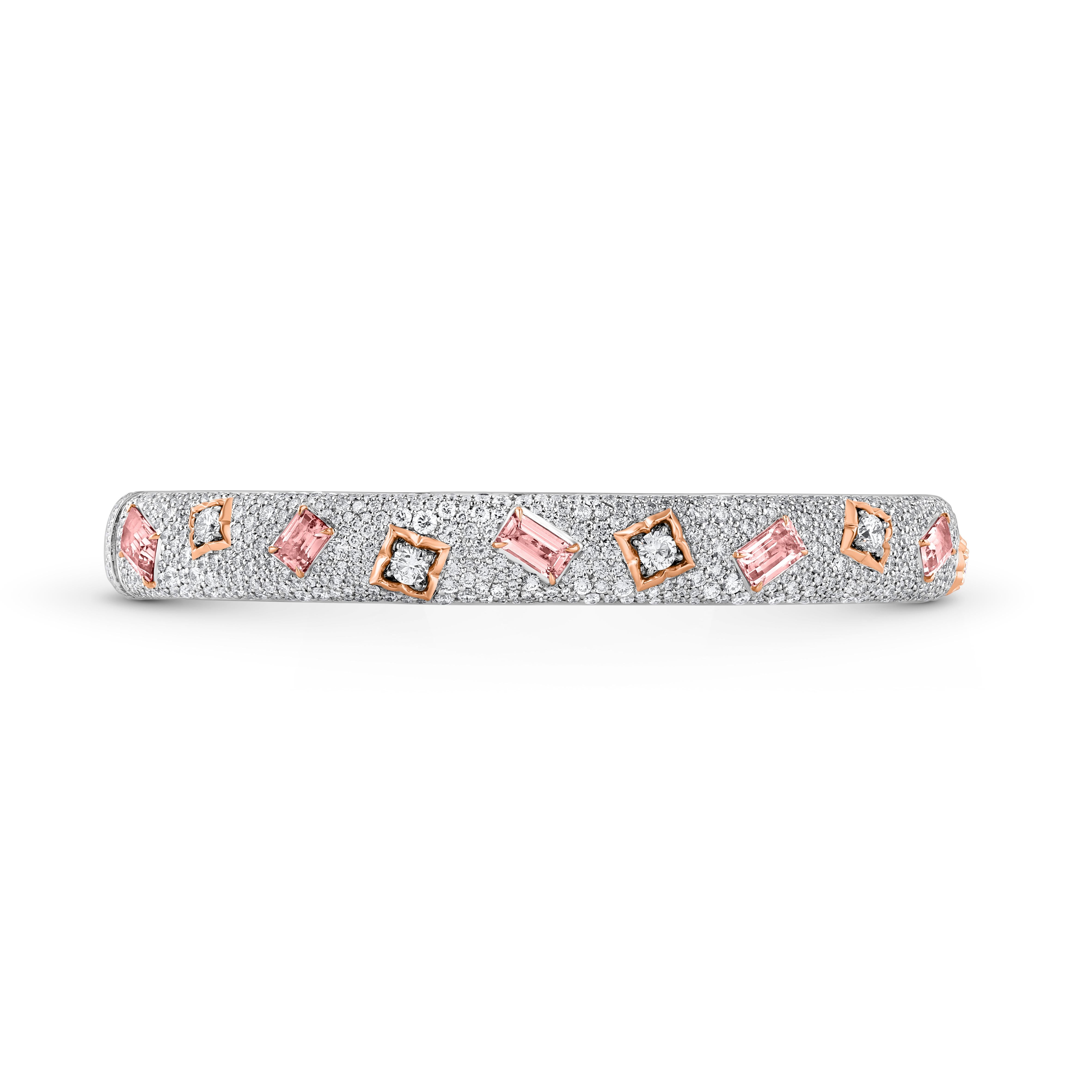 Inspired by sacred symbols that invoke a sense of divinity, this stunning Bangle from the Mandala Collection is adorned with 1025 Brilliant Round Diamonds and a mesmerizing Tourmaline Gemstone. With a total Diamond Weight of 6 3/8 carats and F Color