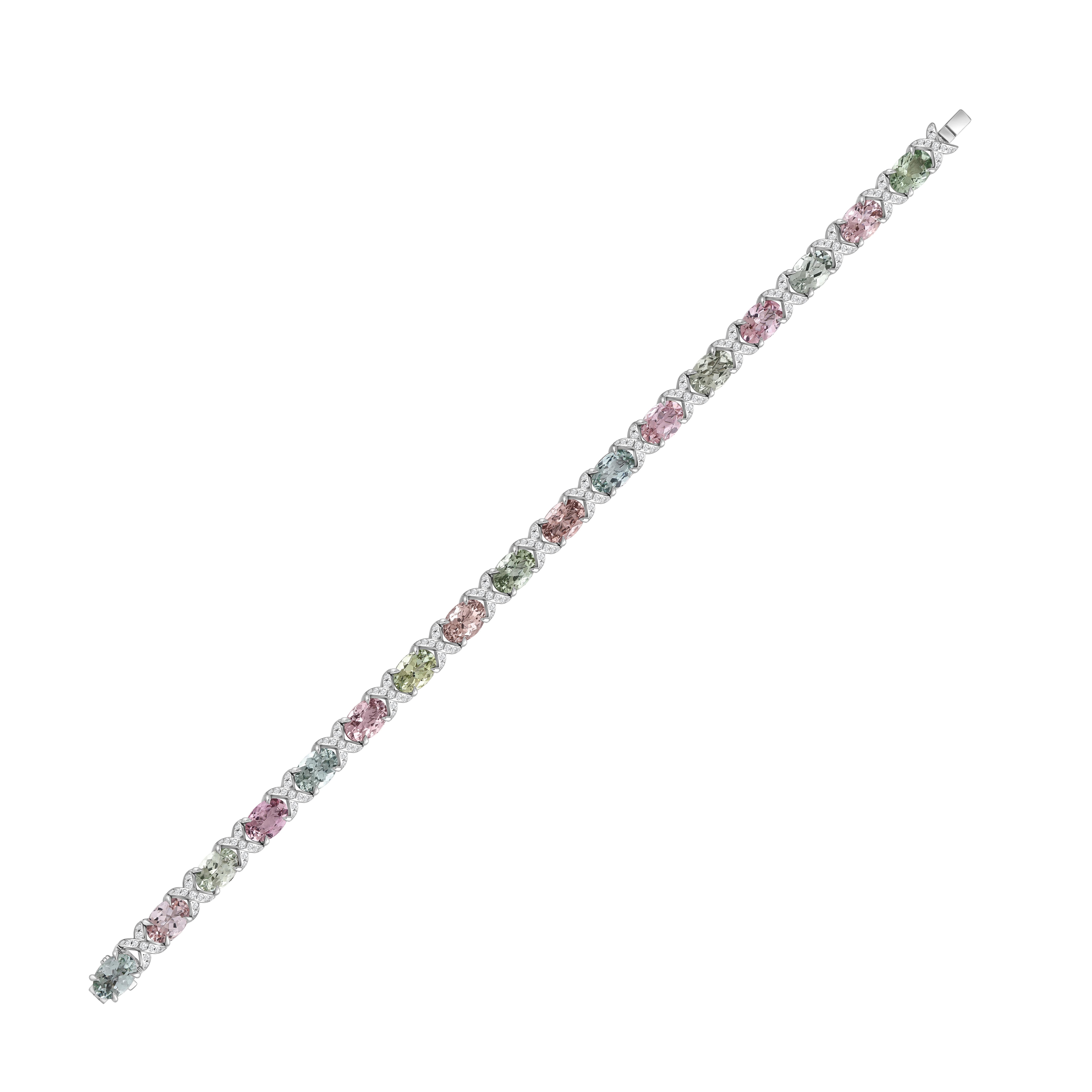 From the HARAKH Raindrop Collection, this exquisite bracelet is crafted in 18KT white gold and features a total of 7/8 carats of brilliant-cut F color, VS2 clarity colorless diamonds paired with serene green & pink tourmaline gemstones. Inspired by
