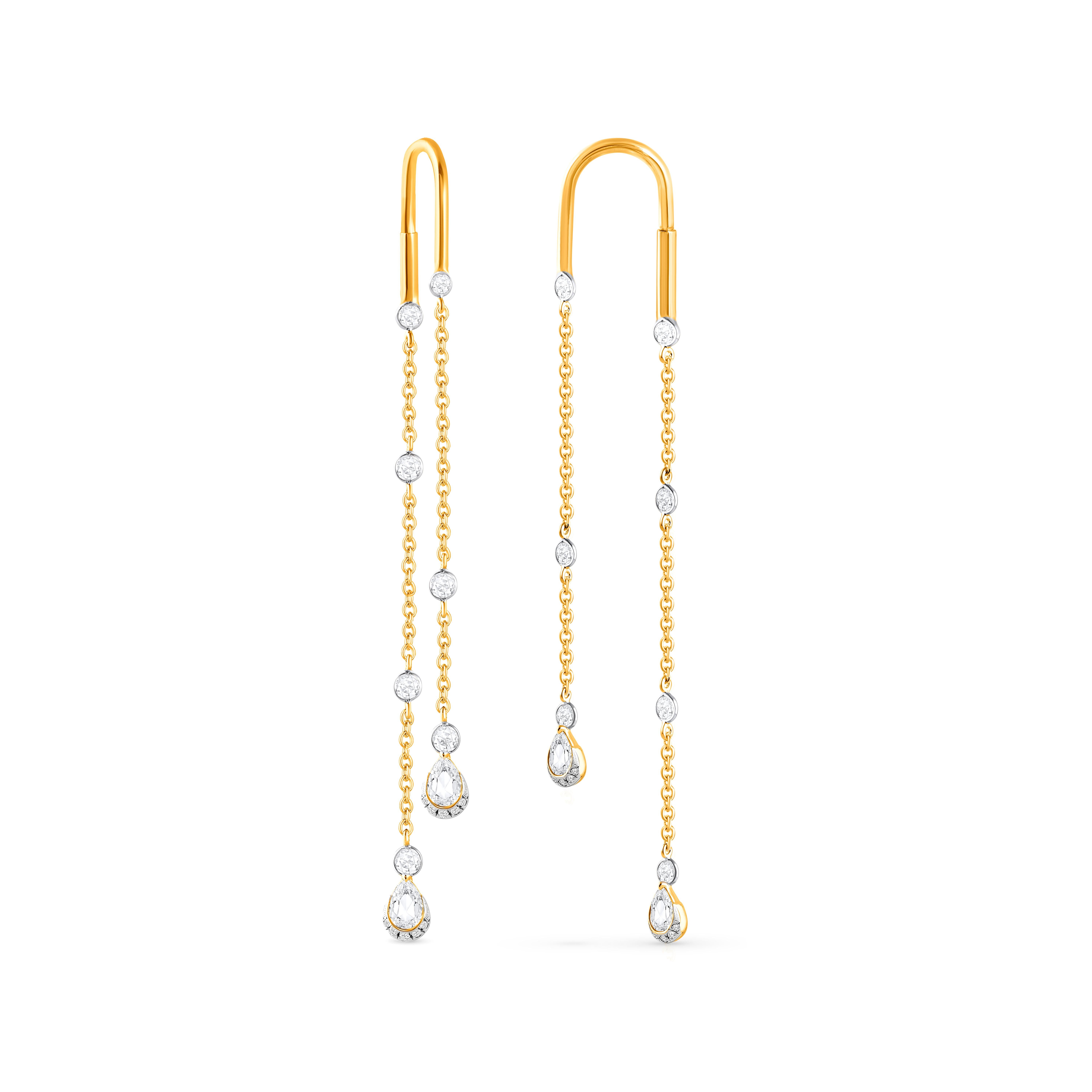 Inspired by the JOY of experiencing a gushing waterfall, these elegantly designed earrings are studded with 7/8 carats natural brilliant and rose cut colorless diamonds in a prong setting and beautifully crafted in 18 carat yellow gold. Our diamonds