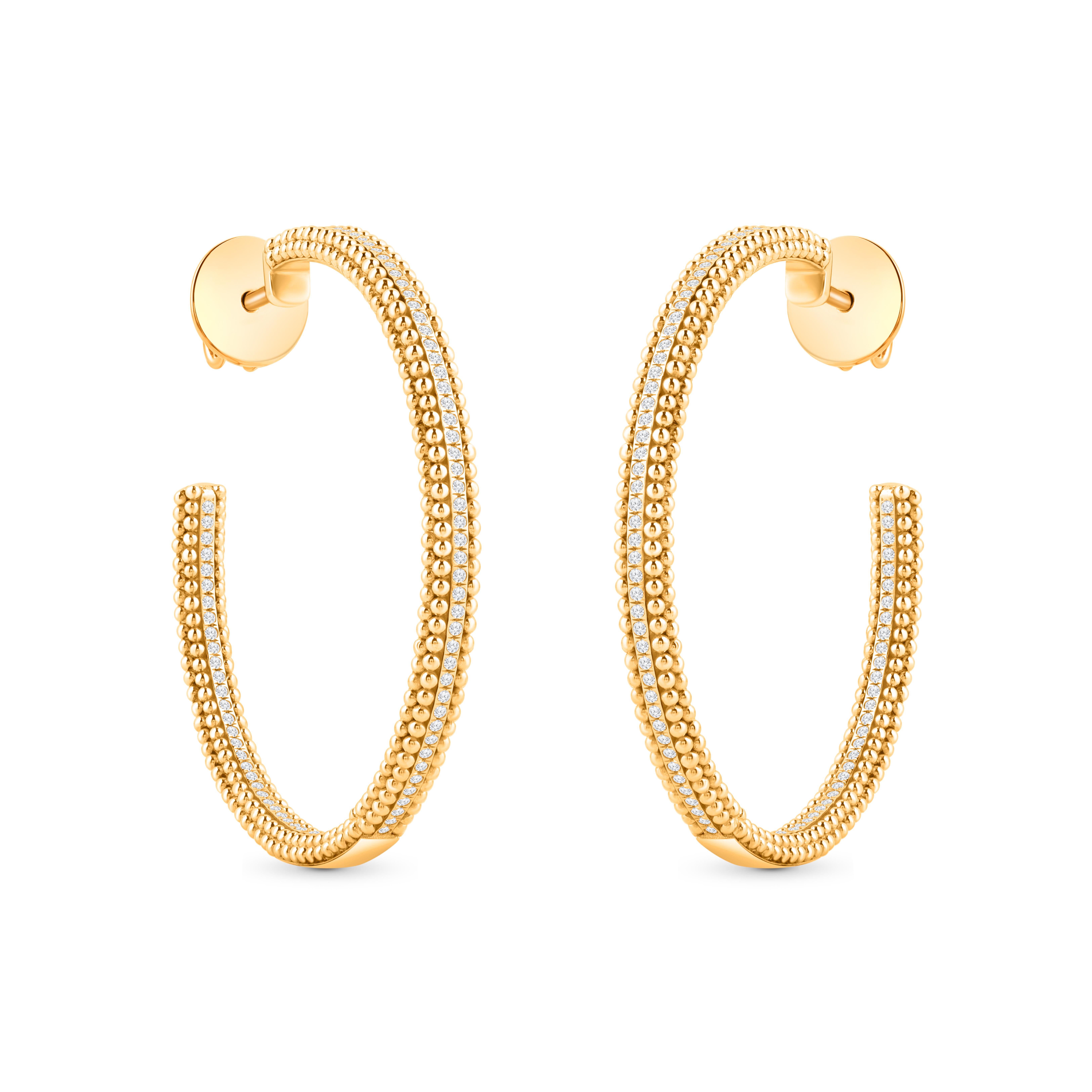 Inspired by the radiant journey of the sun’s golden rays, the HARAKH Auric Sphere Sunlight Earrings glow with a warm, celestial brilliance. Handcrafted in 18KT yellow gold, these hoop earrings feature 1/3 carat of F/VS2 colorless brilliant-cut