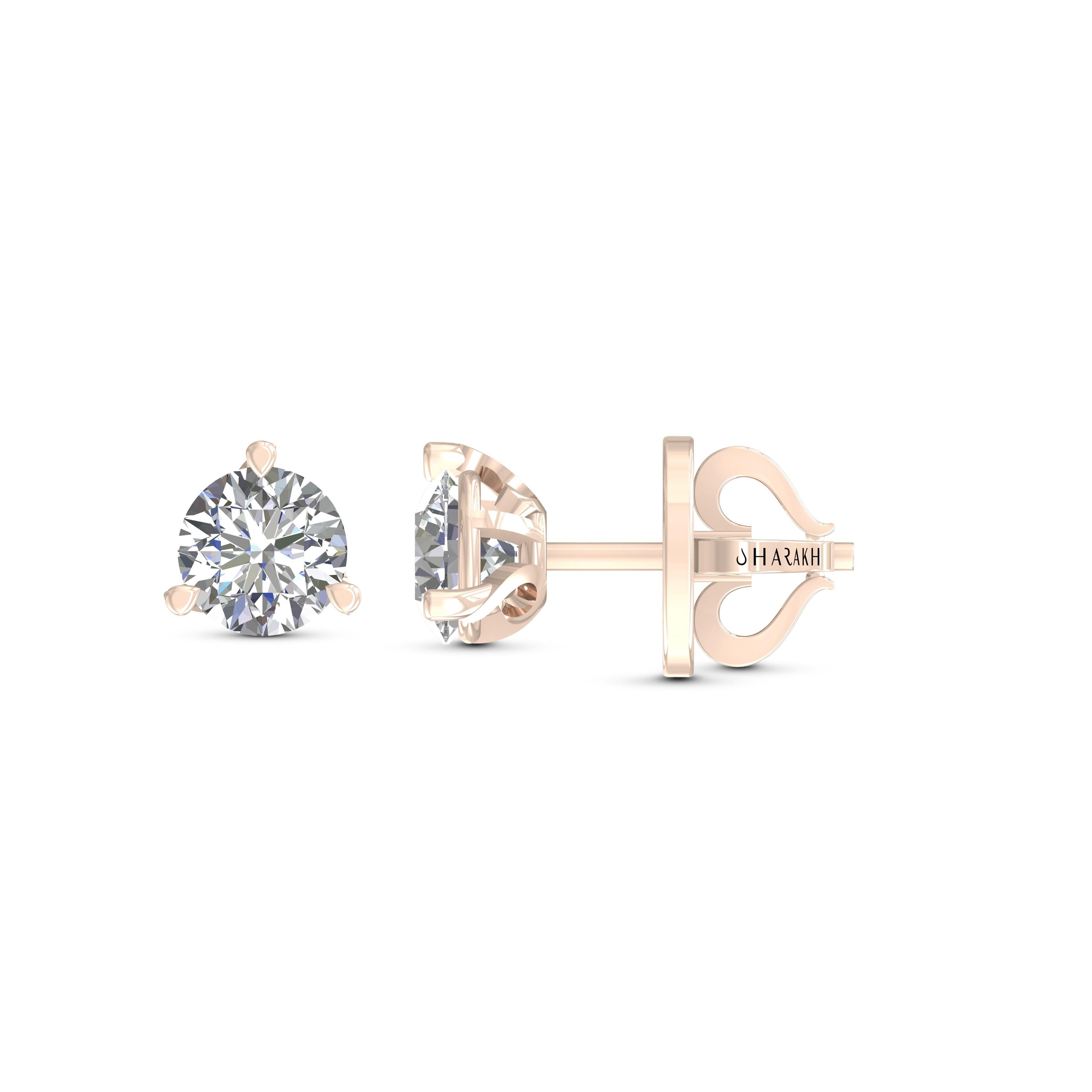 Ces clous classiques en diamant certifié GIA mettent en valeur une paire de diamants parfaitement assortis d'un poids total de 2,00 carats. Fabriquées en or rose 18 carats, dans une monture martini, elles sont également disponibles en or blanc et