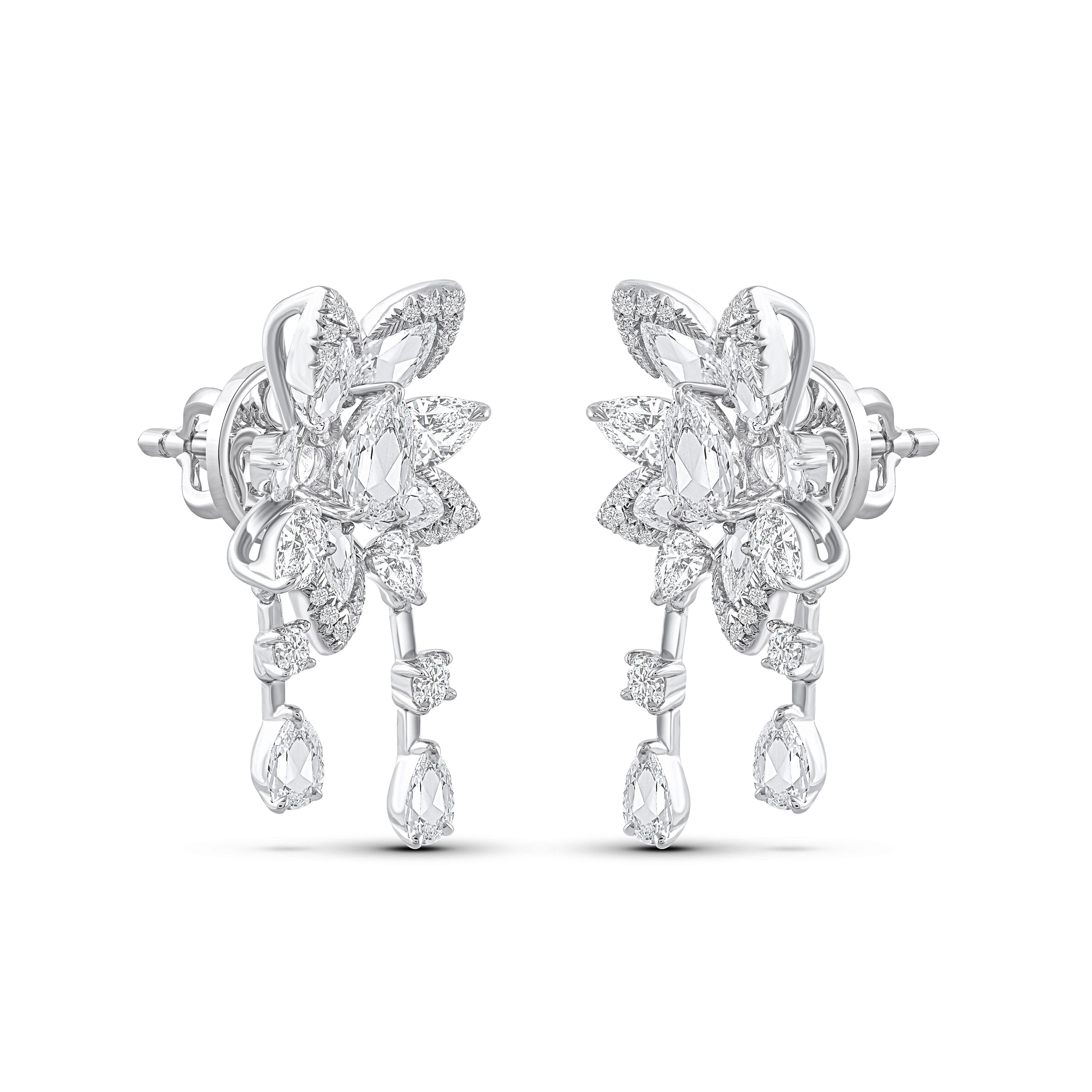 A beautiful arrangement of brilliant and rose-cut diamonds come together to create these drop earrings, which are part of our Cascade collection. Studded with 44 round, 6 pear, and 16 rose-cut pear diamonds. Diamonds are graded as F Color, VS2
