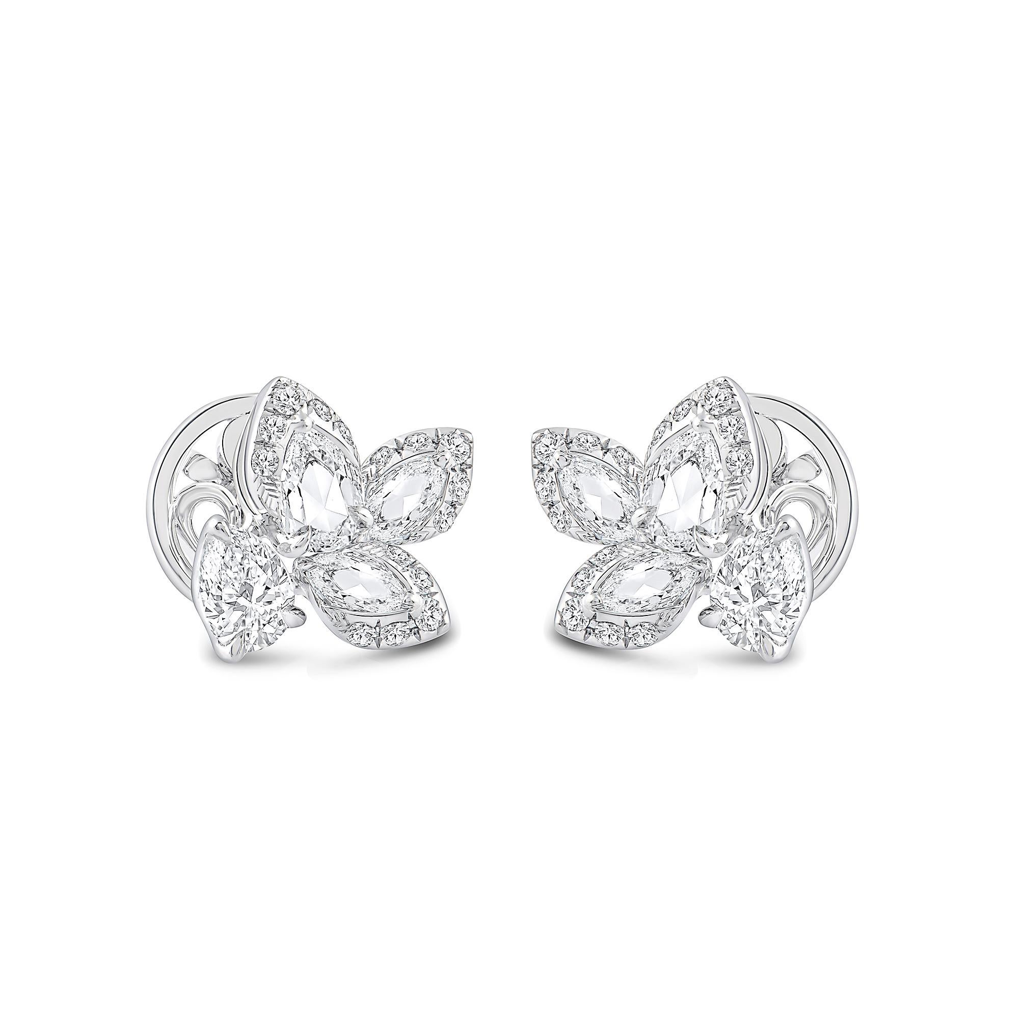 Beautiful stud earrings from our Cascade collection, featuring F color, VS2 clarity diamonds. It has 30 round diamonds, 2 pear, 2 rose cut pear, and 2 rose cut marquise diamonds. The total diamond weight is 1/2 CT, and these earrings are