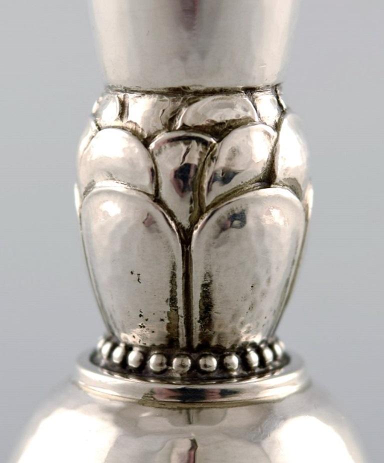 Danish Harald Nielsen for Georg Jensen Art Deco vase in hammered sterling silver. For Sale