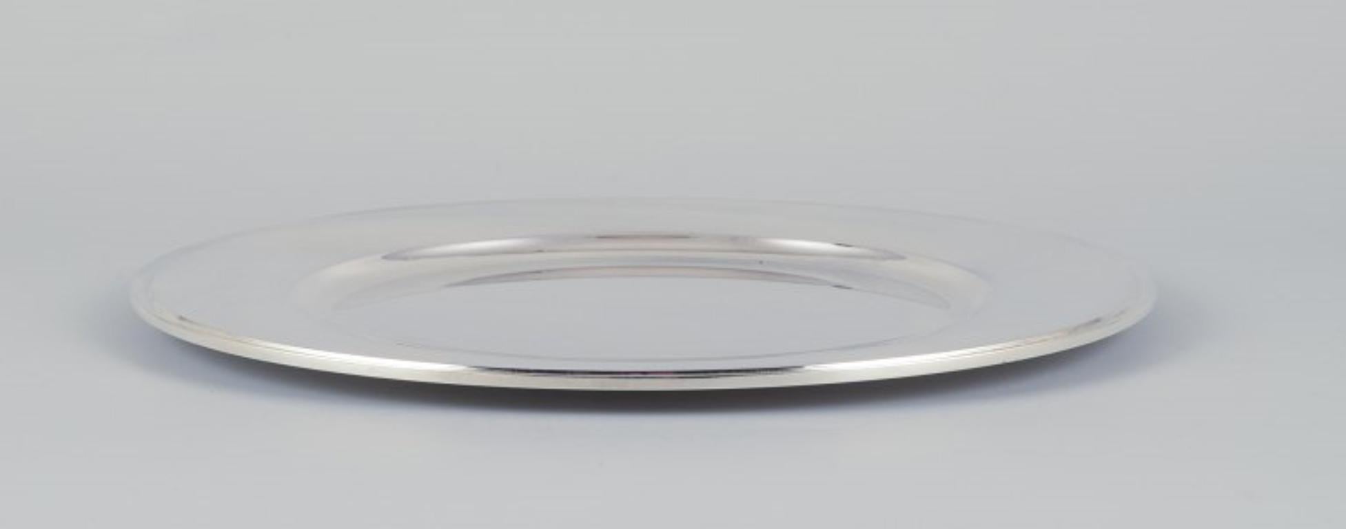Danish Harald Nielsen for Georg Jensen. Charger plate in sterling silver. For Sale