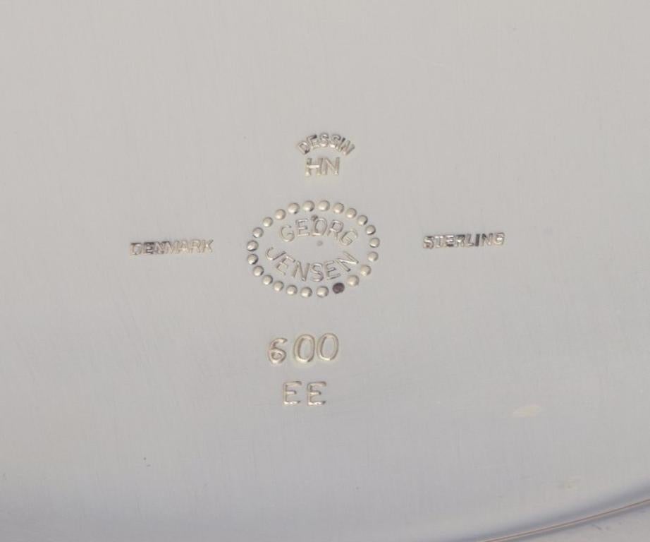 20th Century Harald Nielsen for Georg Jensen. Charger plate in sterling silver. For Sale