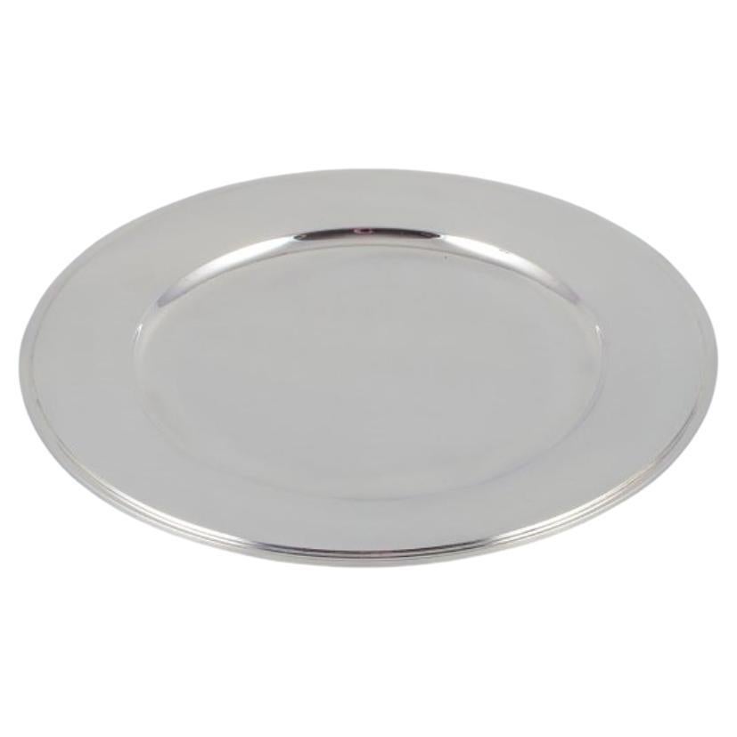 Harald Nielsen for Georg Jensen. Charger plate in sterling silver. For Sale