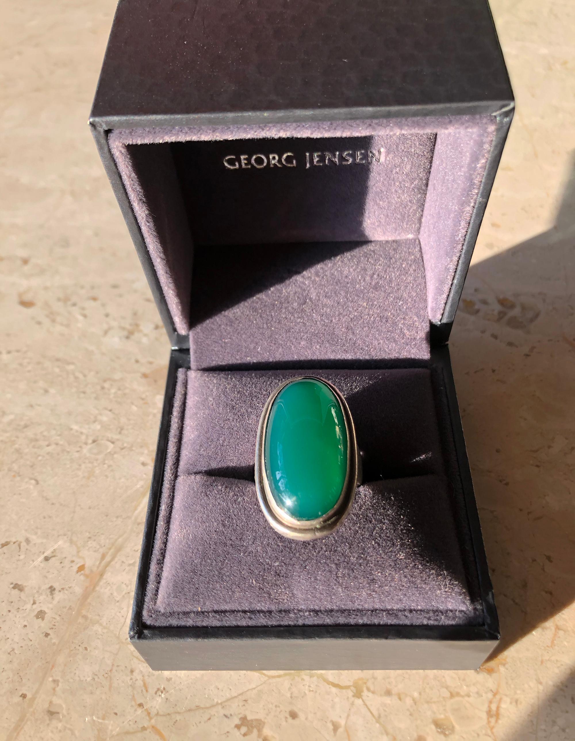 Stunning chrysoprase stone in sterling silver setting ring designed by Harald Christian Nielsen for Georg Jensen, circa 1950's.  Ring is a finger size 7 to 7.25 and is signed Georg Jensen, 46E, Denmark.  Ring comes with a Georg Jensen box as seen in